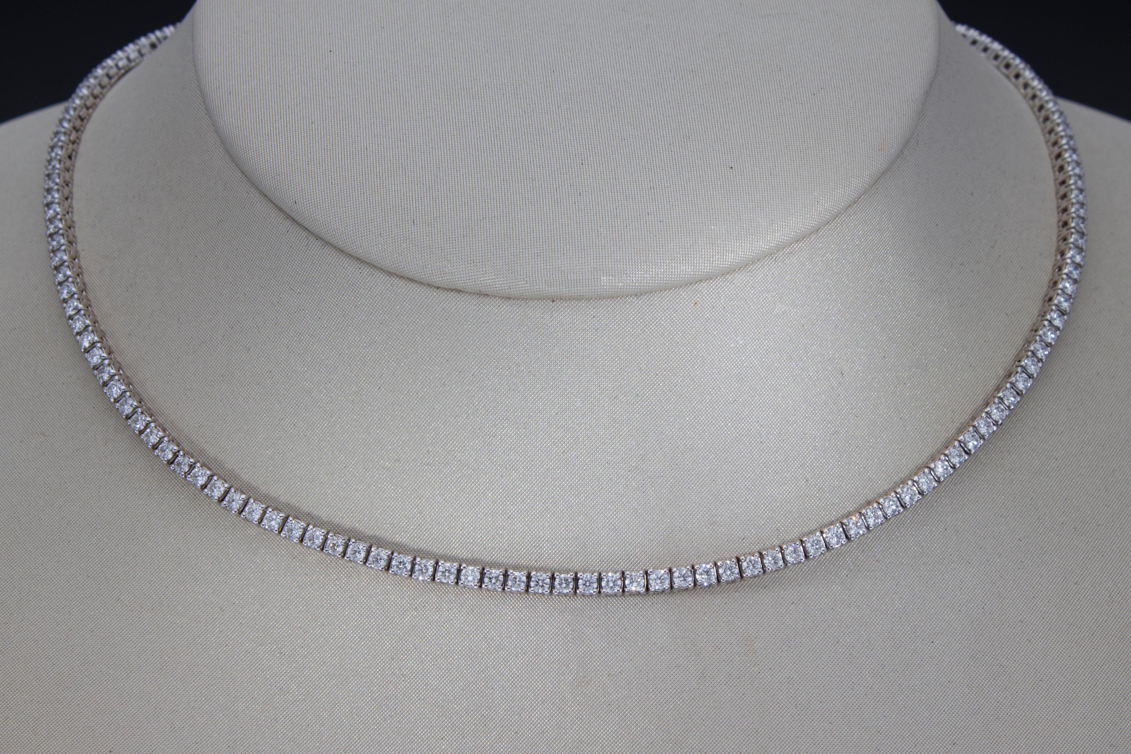 The necklace is made up of a row of 154 brilliant cut diamonds, their total carat weight is 4.41 ct. 
The back of the necklace ends with a chain with ten diamonds, which allows you to wear the necklace with different lengths.
Total length of the