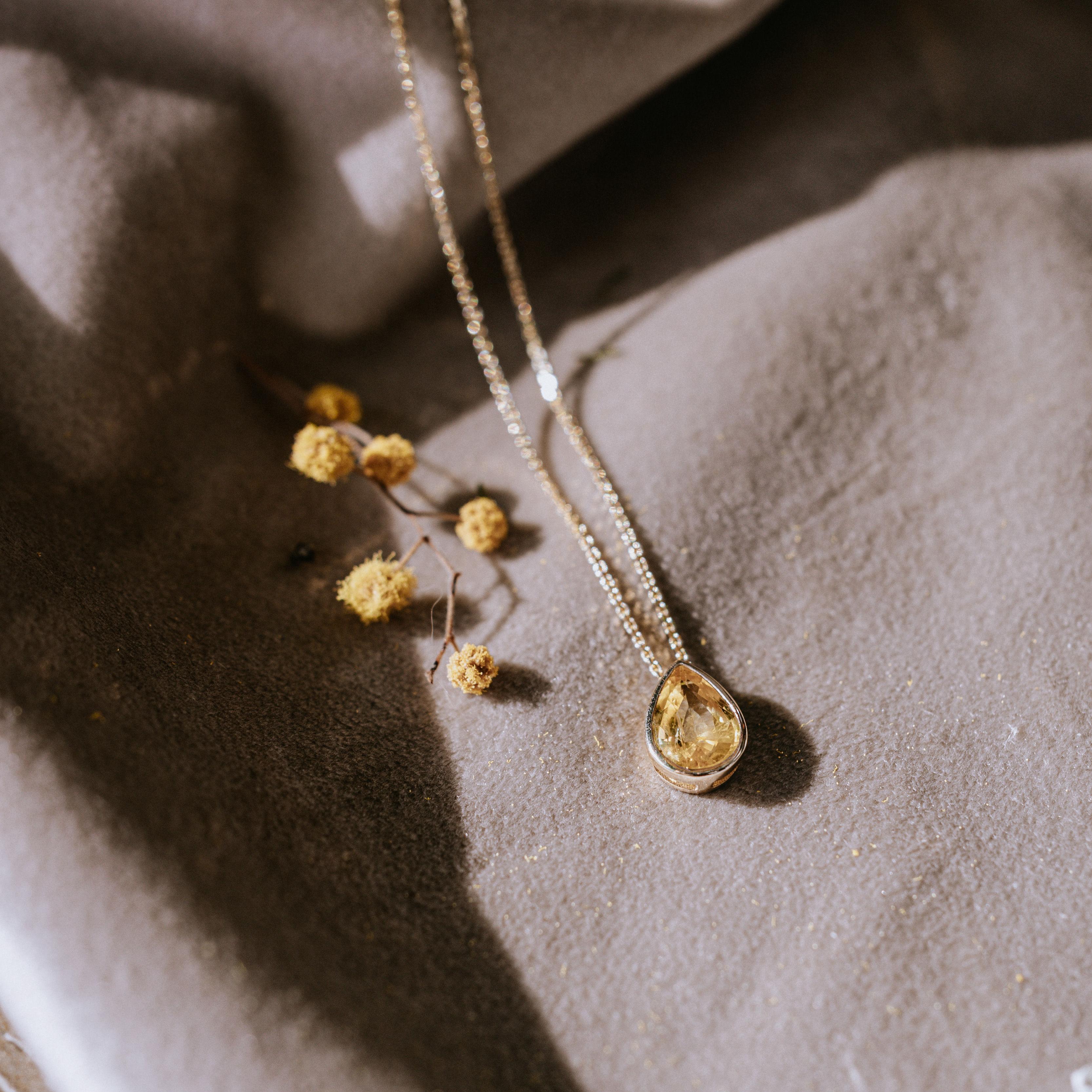 Necklace in 14k yellow gold with 1.71 ct natural yellow sapphire (9.55 x 6mm, pear-cut). Chain 16 inches (can be extended by request).
This necklace reminds about warm summer days, white linen dresses and salty smell of the sea in Ibiza.