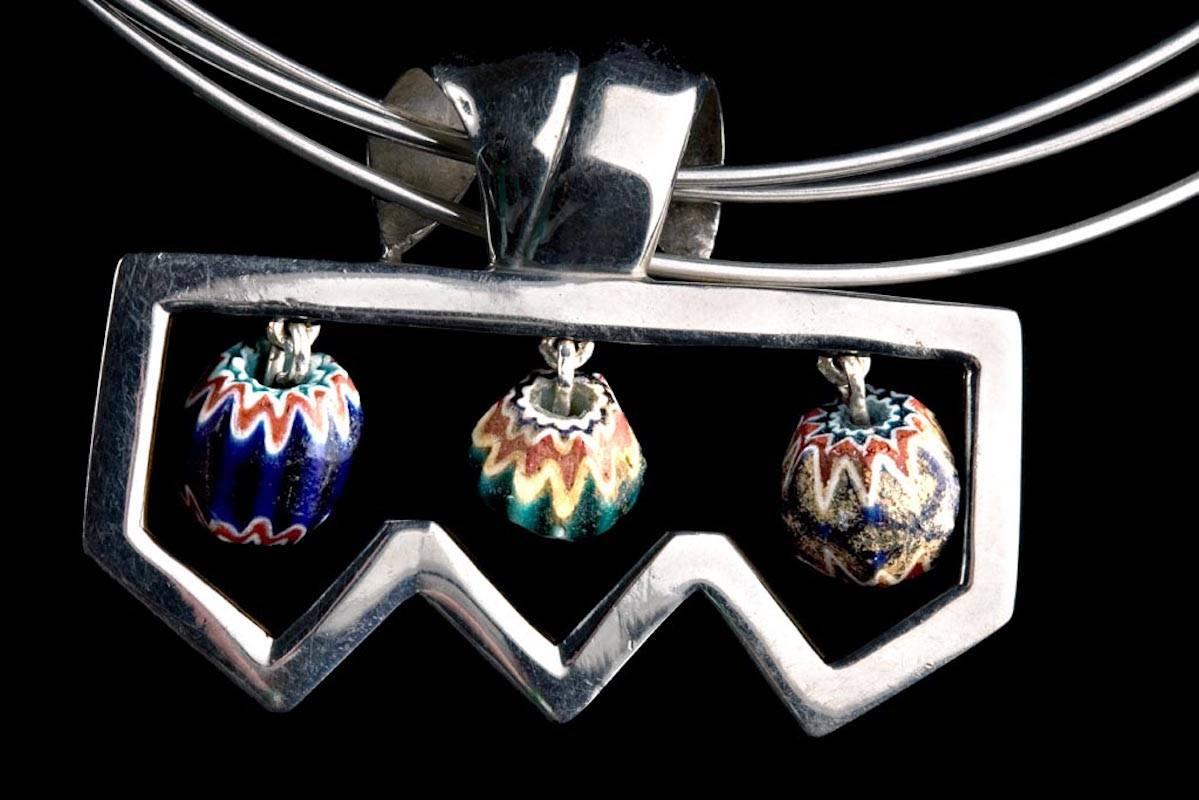 Silver contemporary design necklace with 3 Murano trade glass beads. These beads were brought by the conquistadors from Europe and traded for gold as precious stones. The emperors and shames wore them as jewelry and were often buried with them. Inca