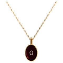 Necklace with amber pendant and name letter gold - G