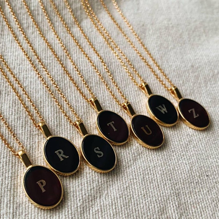 Necklace with amber pendant and name letter gold - R For Sale at 1stDibs