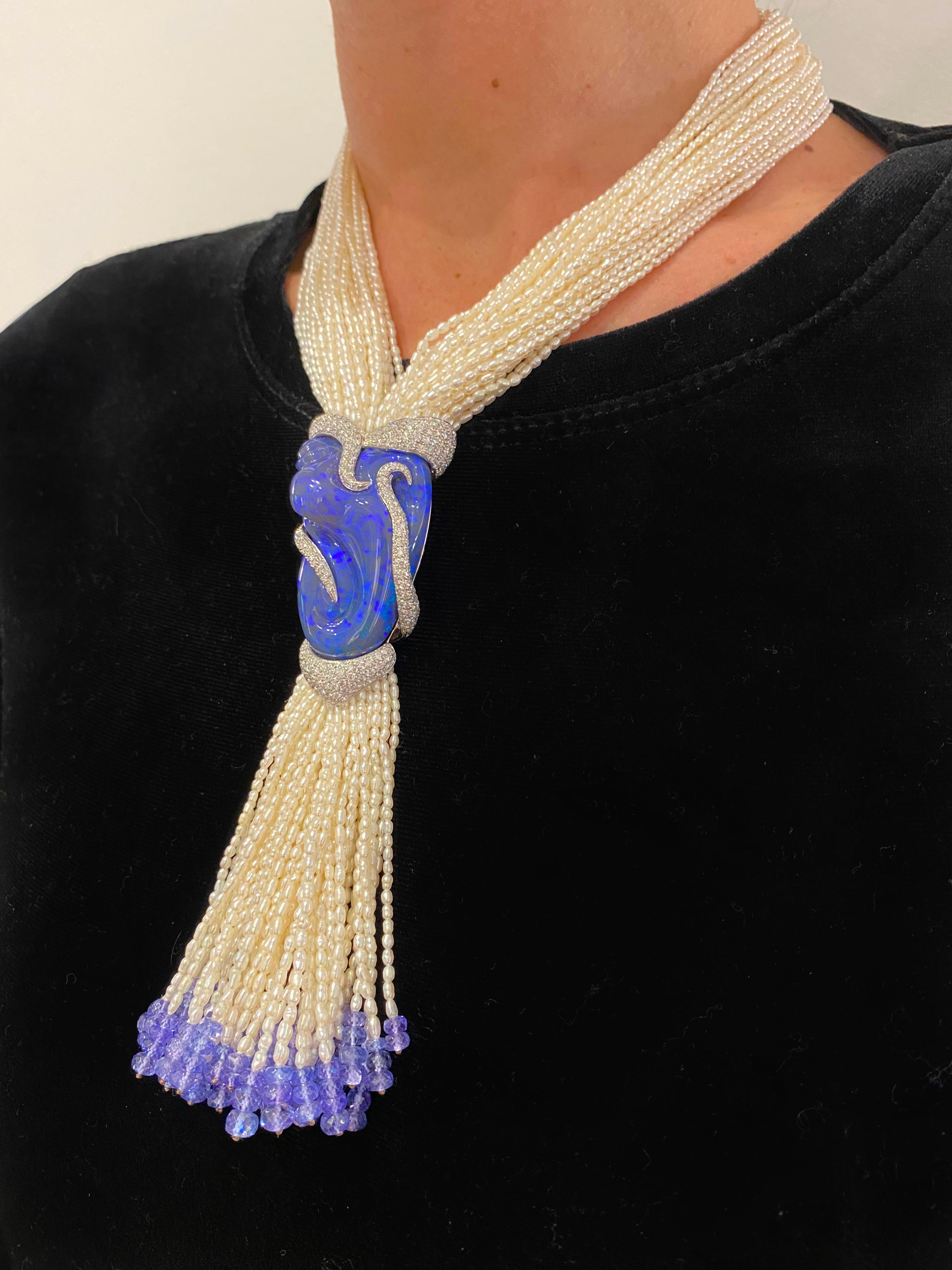 Indulge in the exquisite craftsmanship of this Italian-made necklace, meticulously designed by the renowned jeweler Fulvio Maria Scavia. Cascading with the grace of fine pearl strands and tanzanite beads, the necklace converges into a mesmerizing