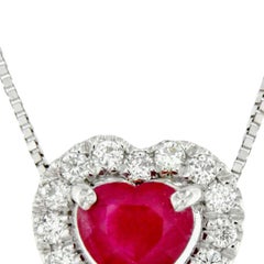 Necklace with diamond and ruby heart pendant