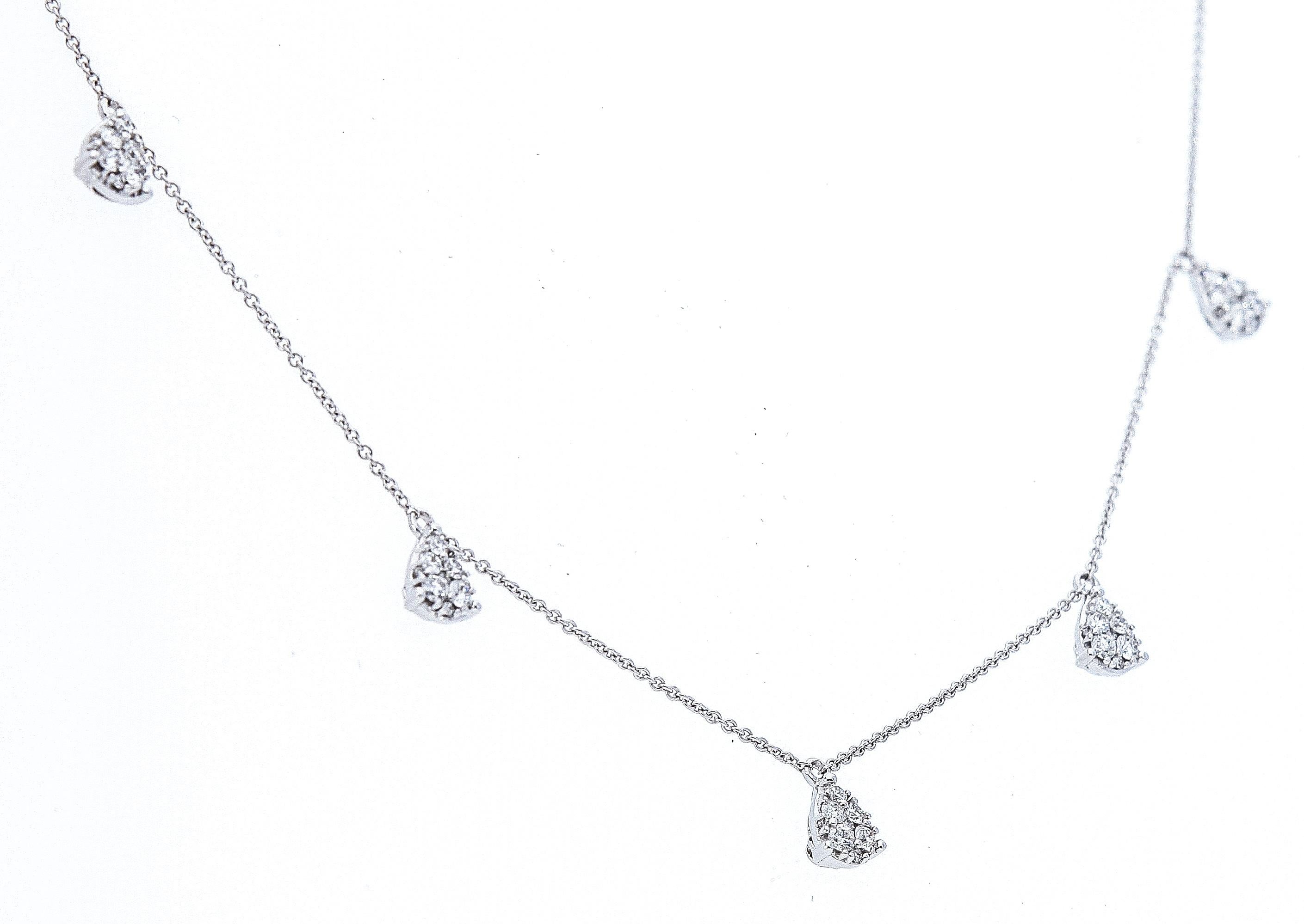 Kettenhalsband aus 18 Karat Weißgold und fünf tropfenförmige Anhänger mit Diamanten
Gesamtgewicht der Diamanten: 0,59 Karat
Gesamtgewicht: 3,3 Gramm
Gesamtlänge: 45 cm / 17,7 Zoll

Die Halskette hat einen zusätzlichen Ring für verschiedene