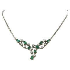 Necklace with emerald and brilliant cut diamonds up to 0.35ct 18k white gold