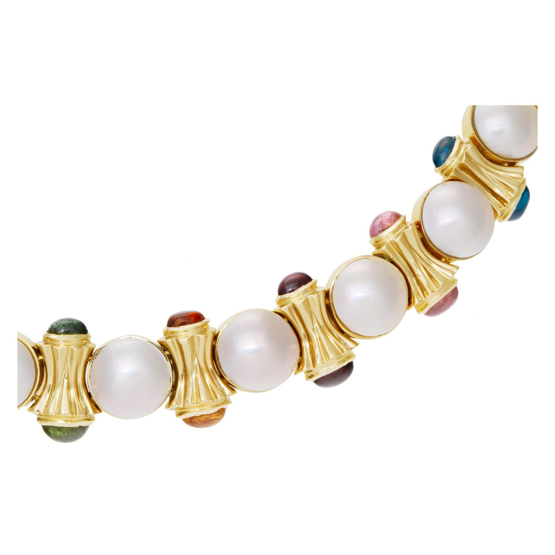 Mobe pearl choker necklace with and colorful blue cabochon, gold topaz, purple amethyst, green peridot and other stones. 11.5mm pearls, 15
