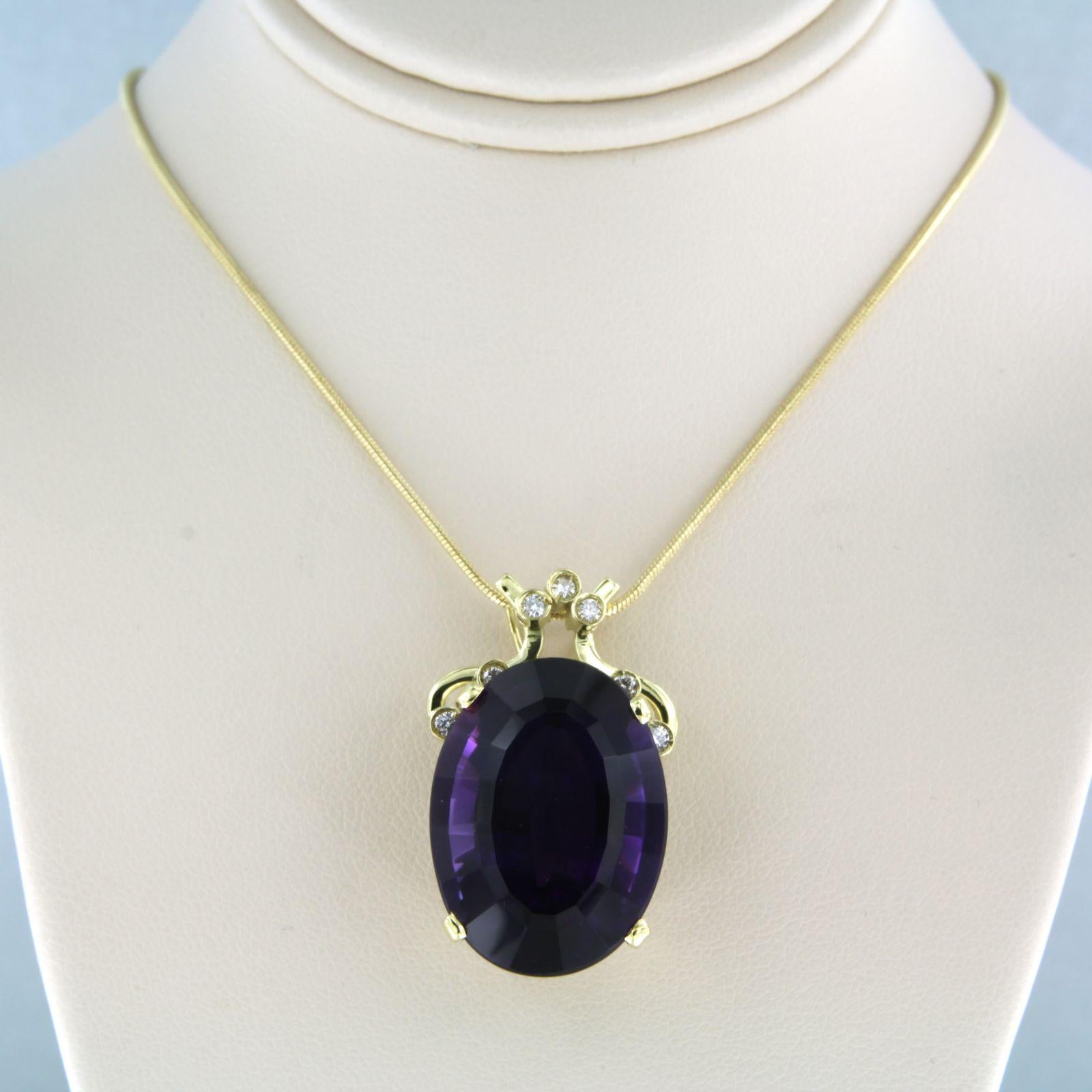 Collana in oro giallo 14k con un pendente in oro giallo 18k con ametista fino a 20,00ct e diamante taglio brillante fino a 0,15ct - F/G - VS/SI - lunghezza 50 cm

descrizione dettagliata:

La collana è lunga 50 cm e larga 0,9 mm.

le dimensioni del