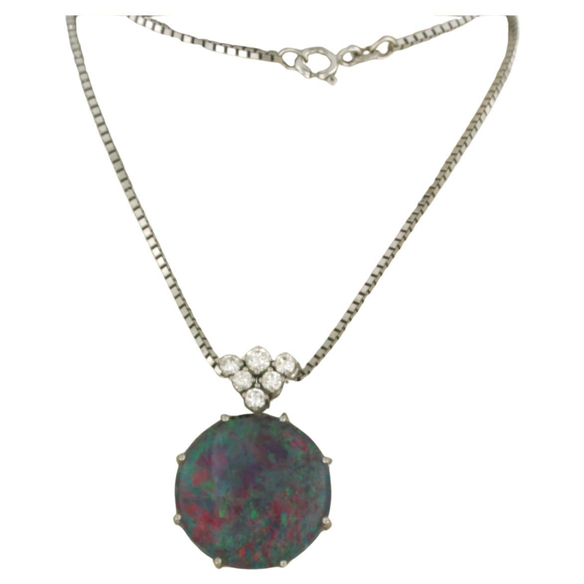 Necklace with pendant set with opal and diamond 14k white gold
