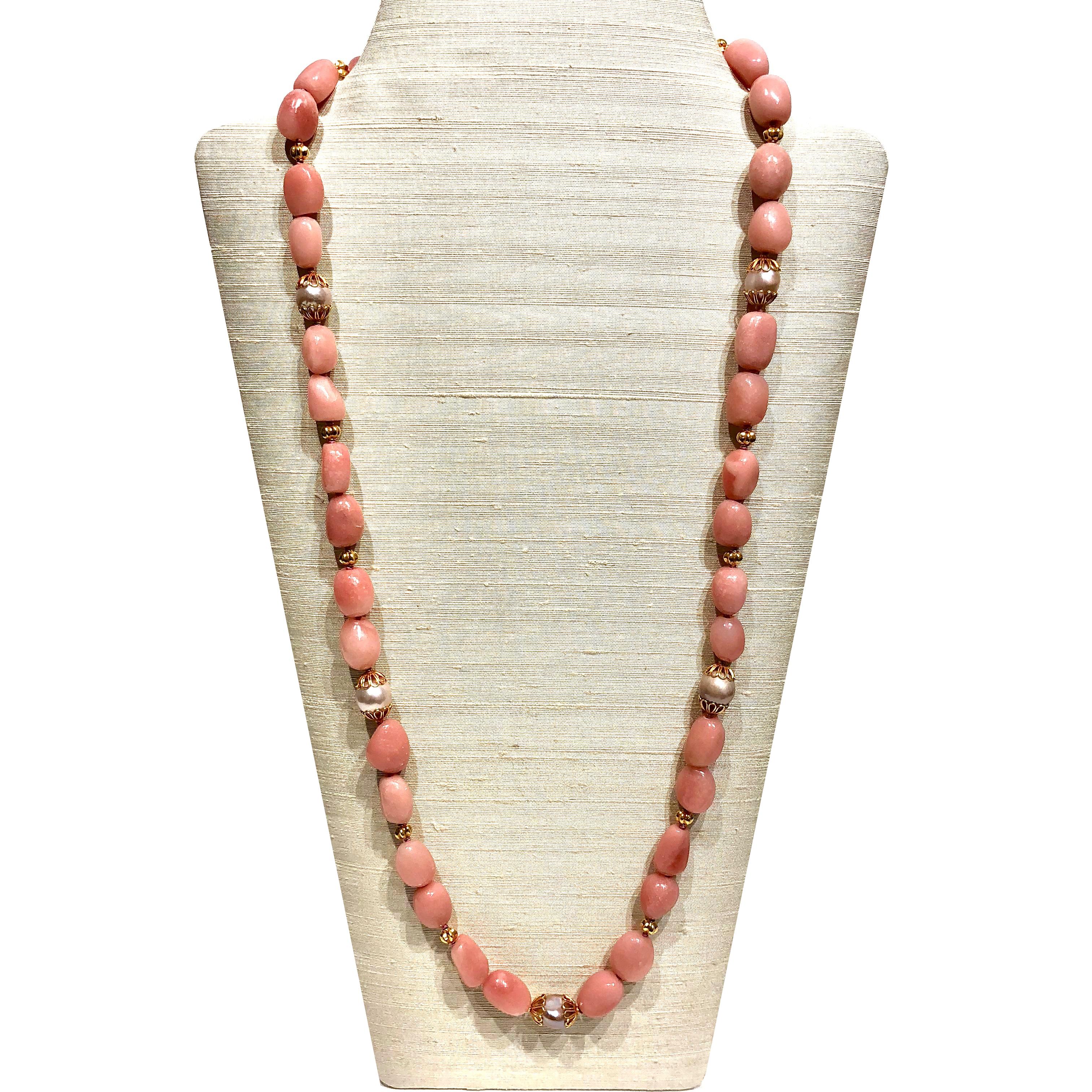 An elegant 33.5 in (85 cm) long necklace with beautiful pink aragonite & pink-toned freshwater pearls and 18k gold beads & clasp. 

Designed by AMANDA CLARK for Altfield, our collection focuses on natures most lovely materials such as pearls, amber,