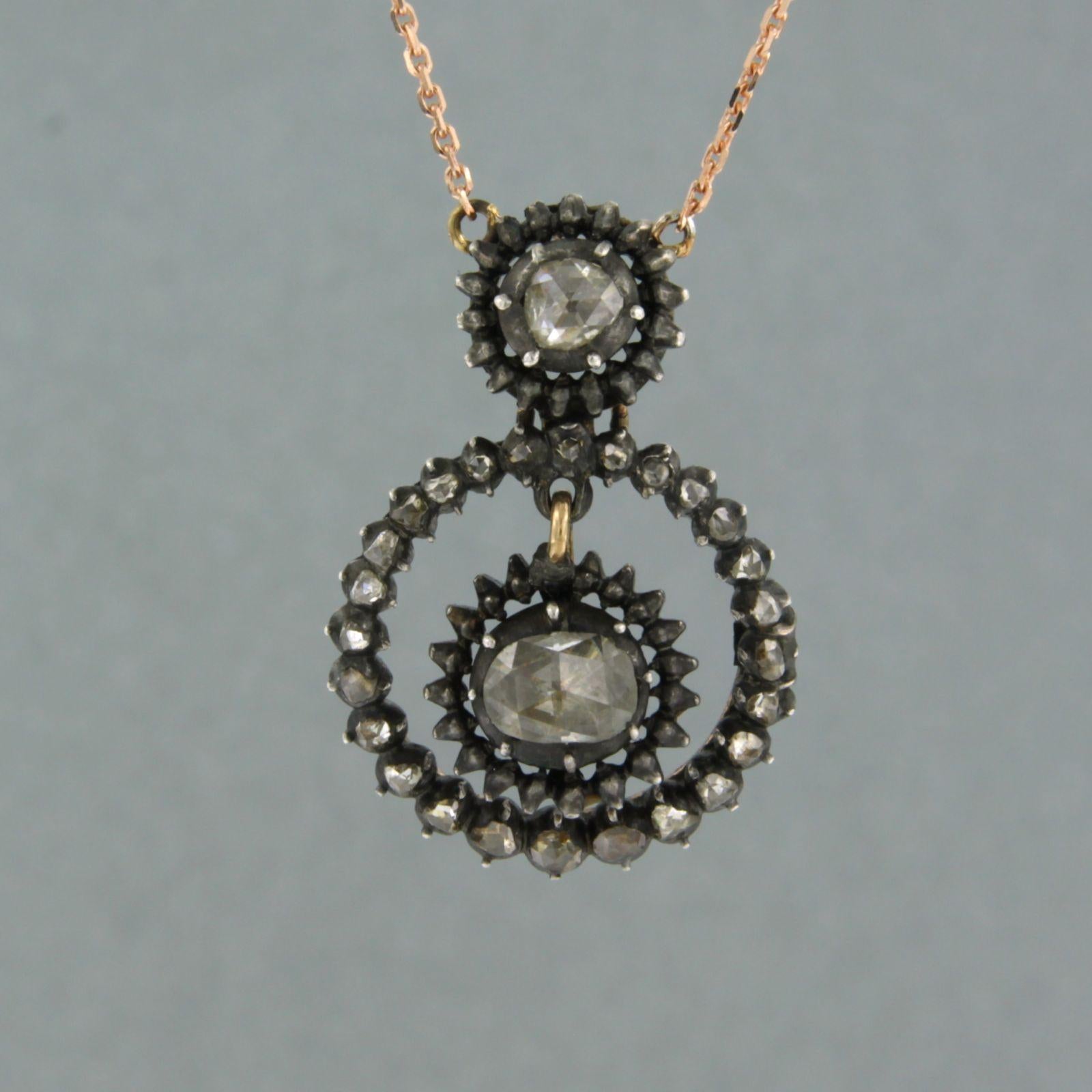 14k rose gold necklace with silver and gold center piece set with rose diamonds. 0.50ct – G/H – SI – 45 cm long   

Detailed description

Necklace is 45 cm long by 0.9 mm wide

the size of the center piece is 2.6 cm long by 1.8 cm wide

total