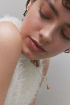 Necklace with sphere and baltic amber gold