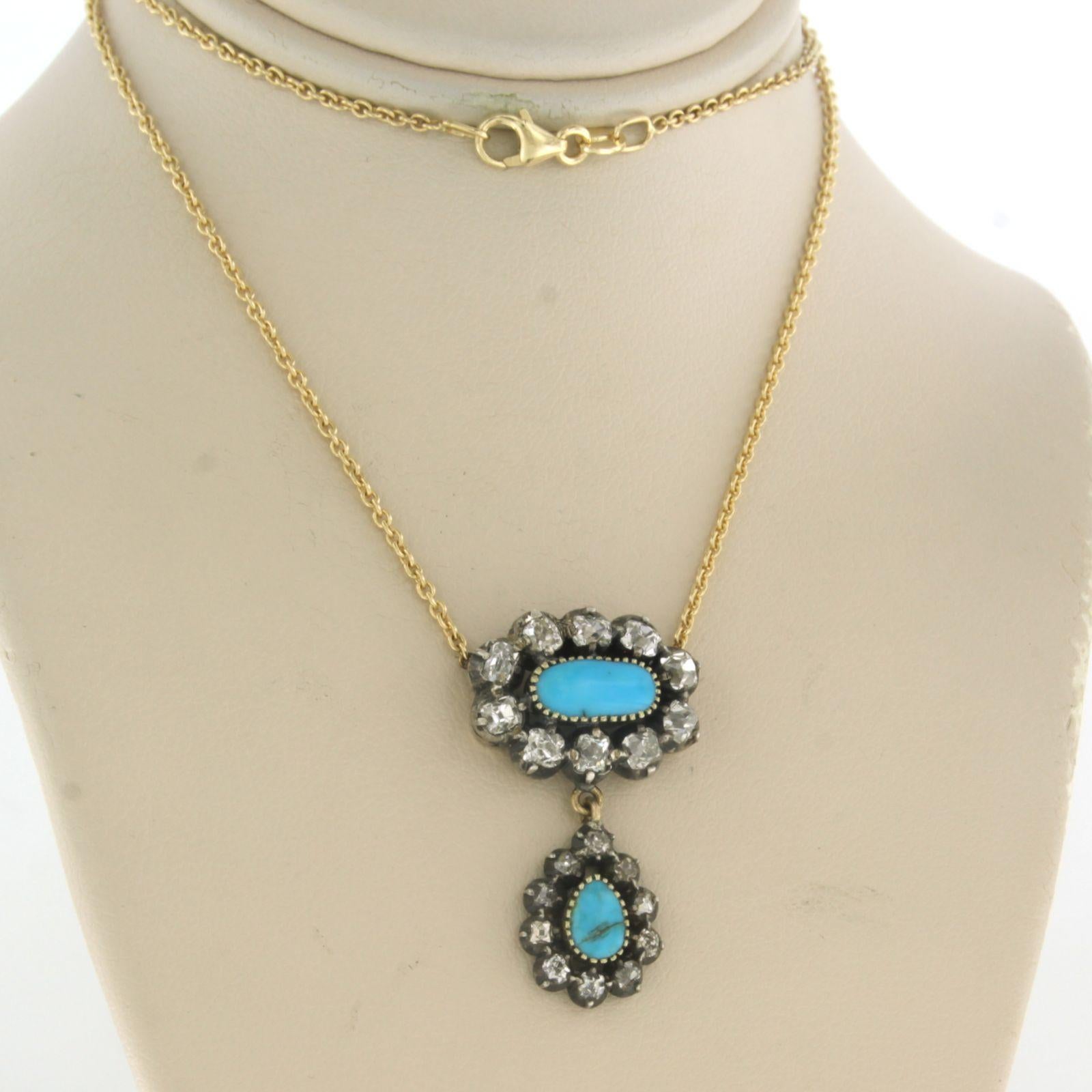 18k yellow gold necklace with 18k gold with 835 silver middle section set with turquoise and old mine cut diamond 1.50 ct F/G SI - 40 cm

Detailed description

the necklace is 40 cm long and 0.7 mm wide

The size of the pendant is 3.0 cm high and