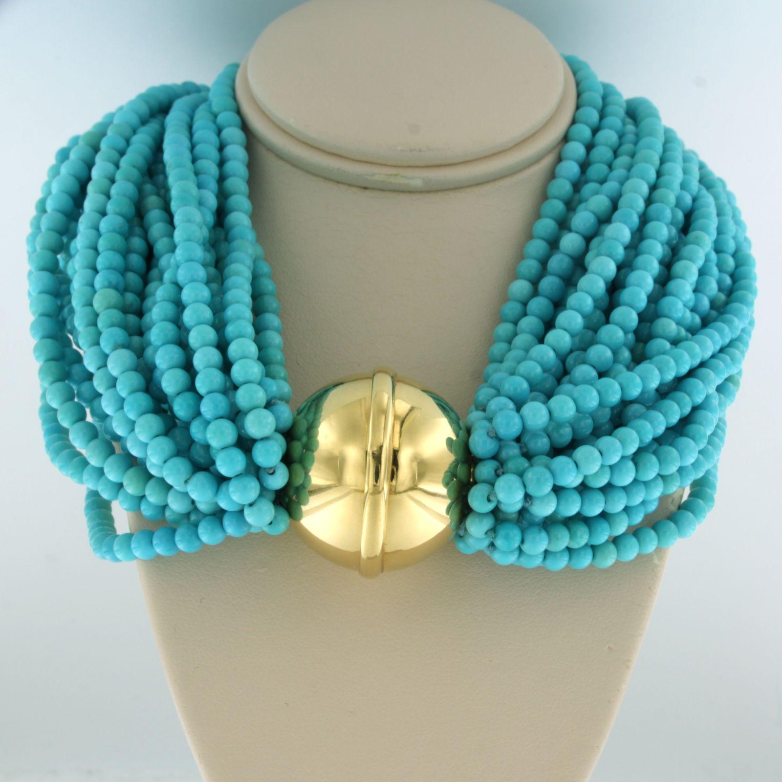 18k yellow gold clasp on a 24 strand turquoise beads - 40cm long

Detailed description

the length of the necklace is 40 cm long and approximately 2.5 cm wide

The size of the lock is 2.9 cm wide in diameter

estimated weight of the lock is 40