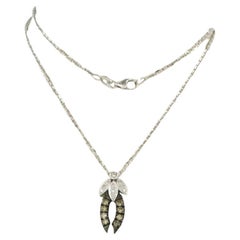 Necklace witn pendant with brilliant cut diamonds up to 0.20ct 18k white gold