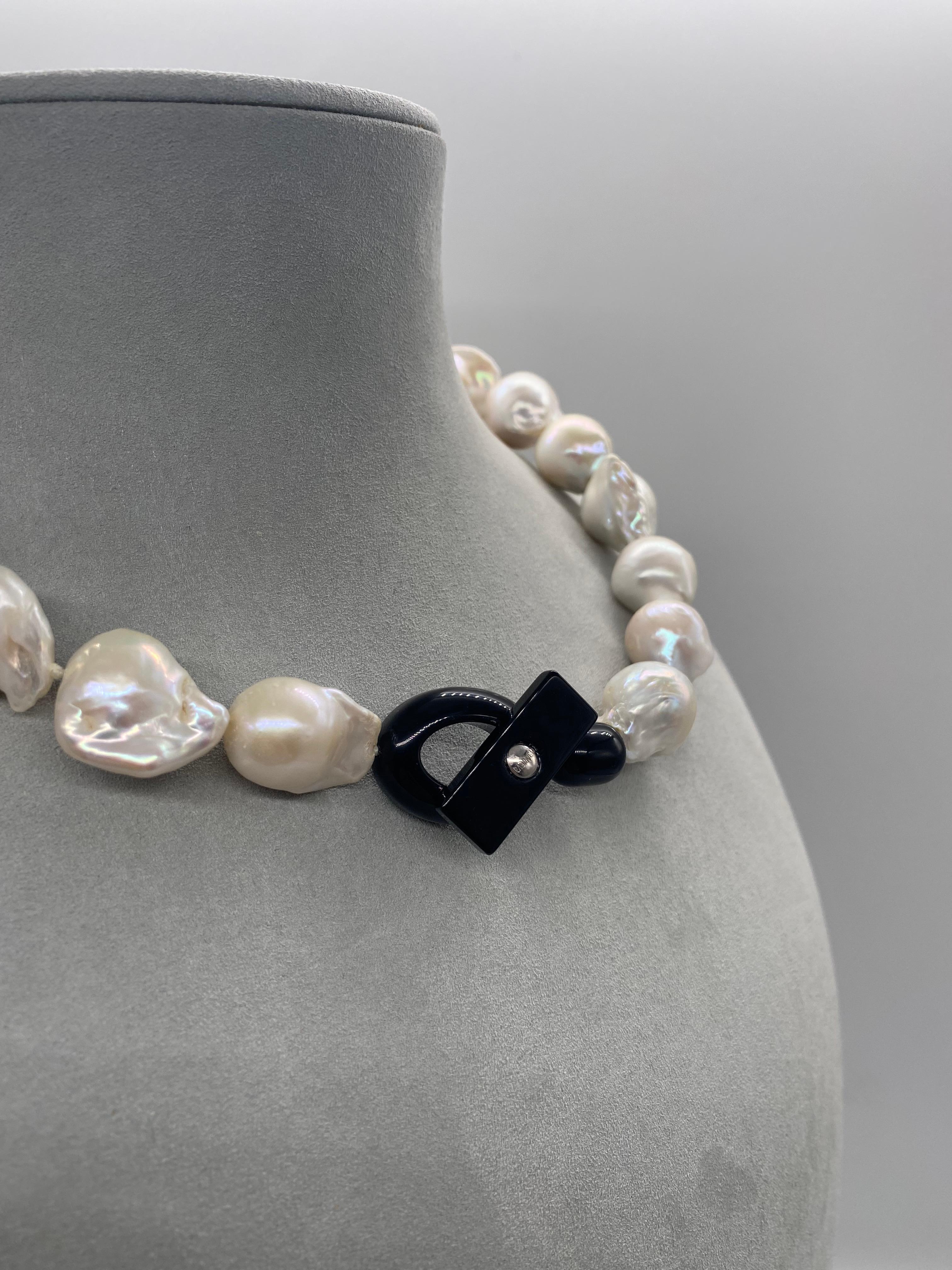 thumbnail interactive-video image 1 of Natural South Sea Black Keshi Baroque Pearl Necklace – 20” Yellow Gold Plated 1 of 5