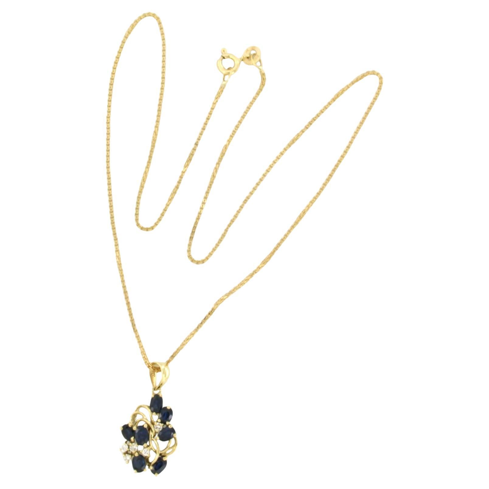 Collana e pendente con zaffiro e diamanti taglio brillante in oro 18 ct.