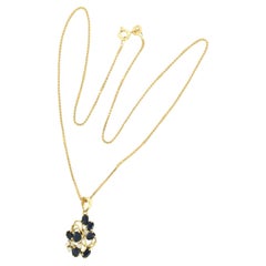 Collana e pendente con zaffiro e diamanti taglio brillante in oro 18 ct.