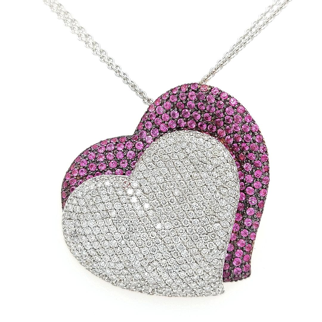 Amazing necklace / pendant pavé set with pink sapphires and diamonds of top quality.

This beautiful heart shines from far and will make you beloved ones smile from happiness.

Upper level craftsmanship, even the rose gold back is cut out in heart