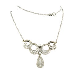 Neclace with single and brilliant cut diamonds up to1.75ct 18k gold and platinum