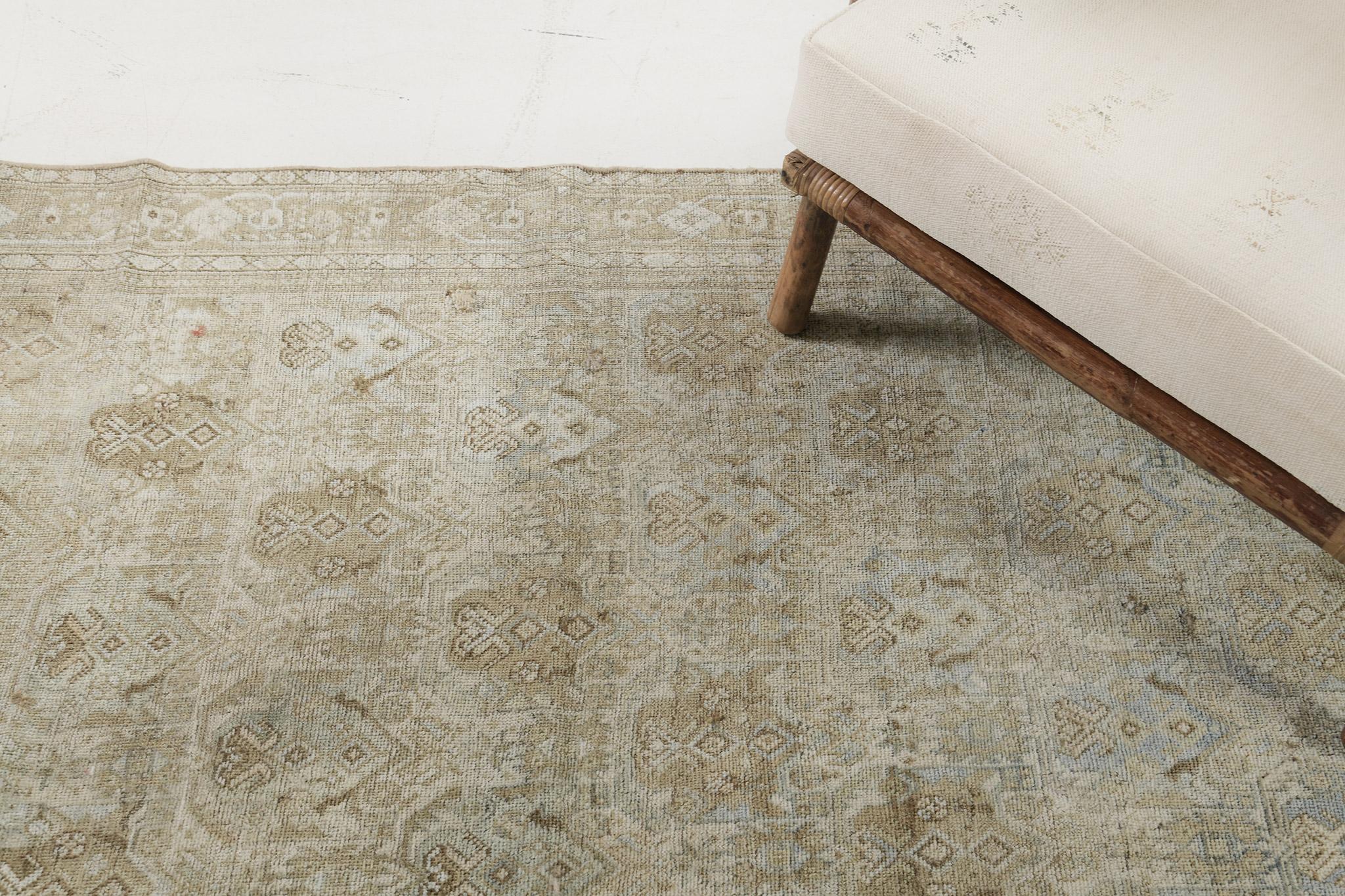 This rug features bold, beautiful styling that is easily recognizable in the marketplace of rugs. It features darker brown and turquoise colors in contrast to the typical bright reds of most Vintage Persian Shiraz Rugs. Therefore this rugs distinct
