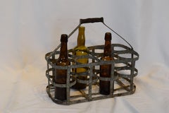 Panier de transport de huit bouteilles de vin français du début du 20e siècle