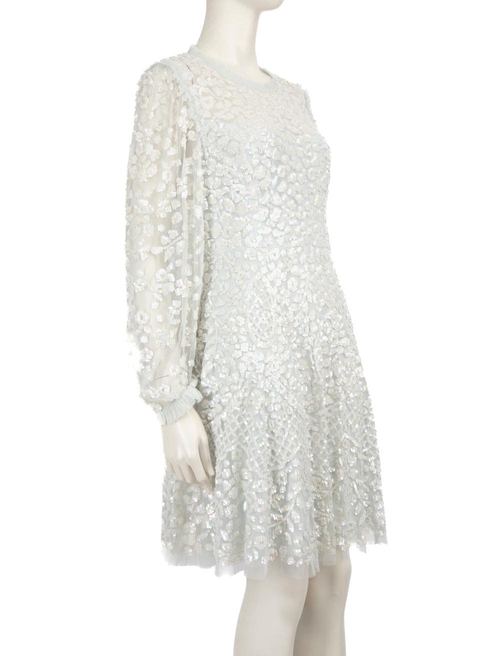 CONDITION is Very good. Minimal wear to the dress is evident, there is loose thread on the back hem and a few embellishments are missing on this used Needle & Thread designer resale item.
 
 Details
 
 
 
 
 Blue
 
 Polyester
 
 Dress
 
 Knee