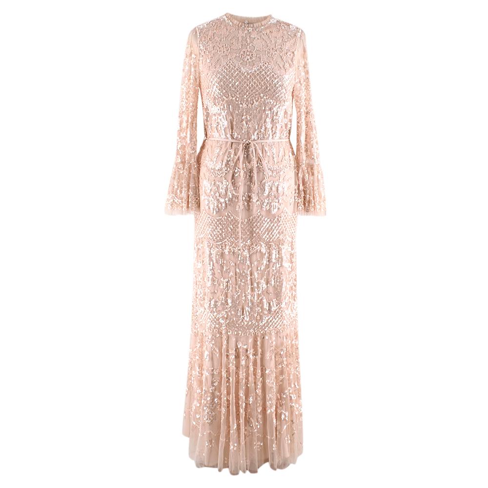 Needle & Thread Pearl Rose/Pink Sequin Tulle Snowdrop Gown
-Show-stopping gown adorned with shimmering gloss sequins
-Crafted from tulle with signature Needle & Thread ruffle trims at the neckline 
-Loose-fitting silhouette 
-Detachable tie