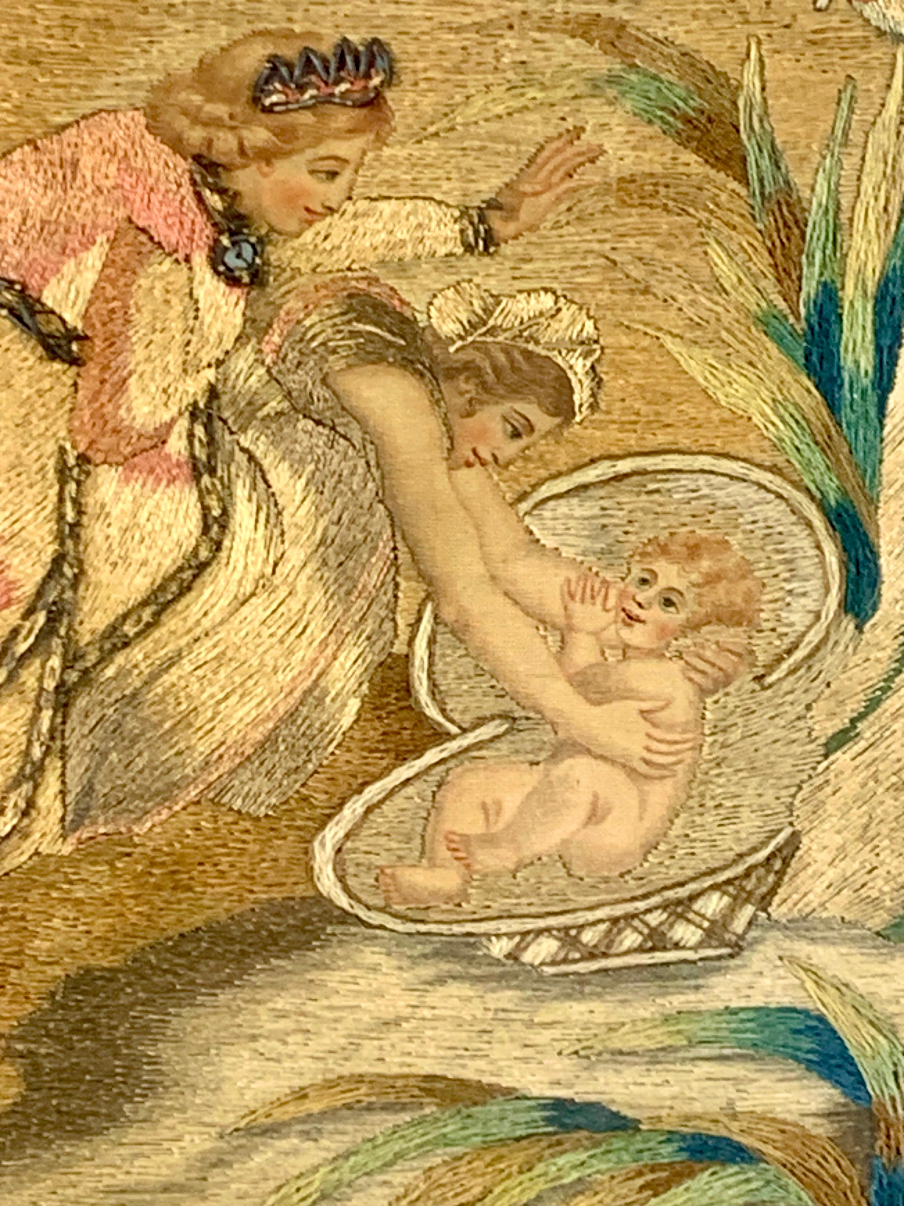 The Bible story of baby Moses drawn from the River Nile made with silkwork and chenille. 
Moses is gently taken from a basket made of reeds while his sister Miriam watches over him.
The women's dresses are Victorian in style. The colors are