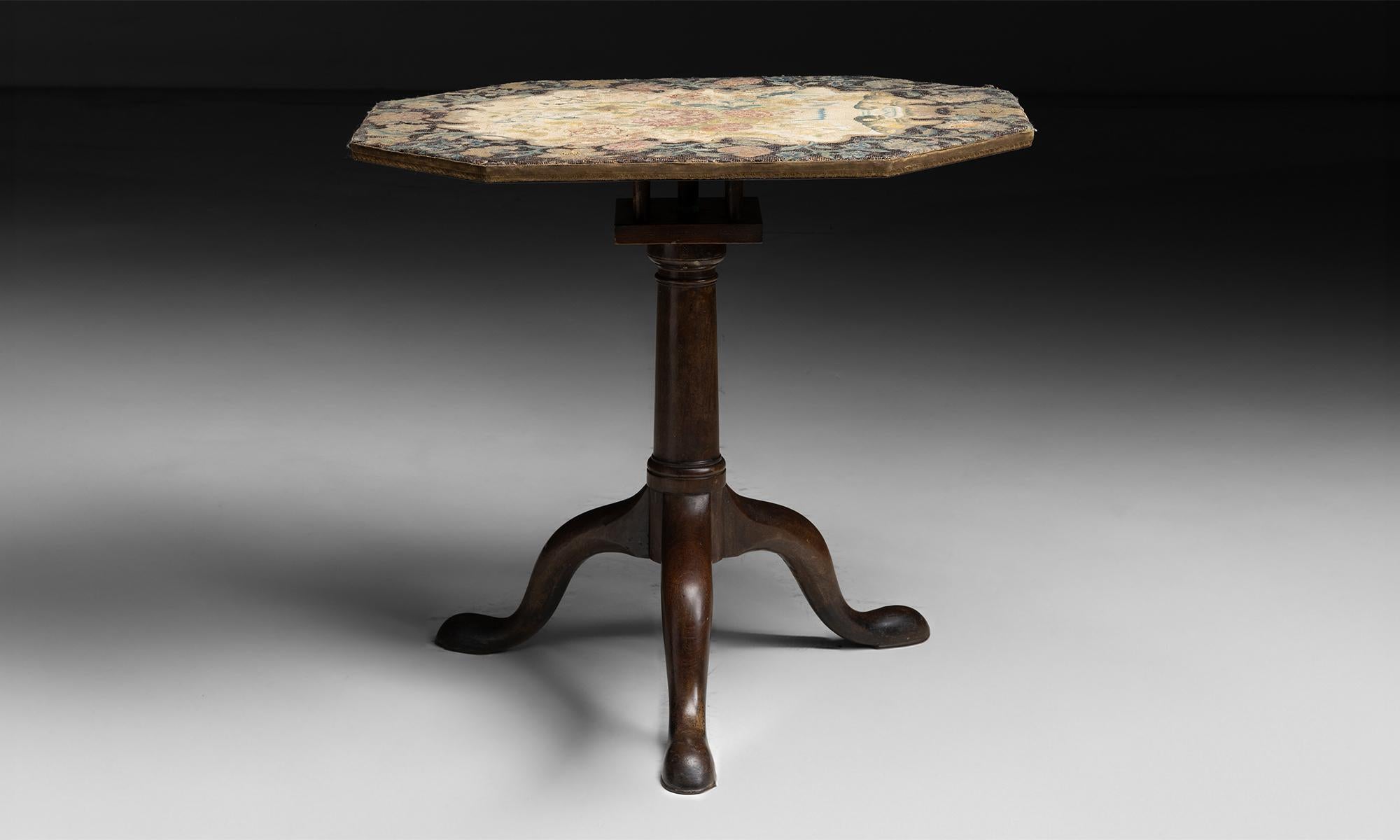 Needlework Table

England circa 1770

George III era tilt top table constructed in mahogany with needlework top.

32”w x 24.5”d x 29.5”h