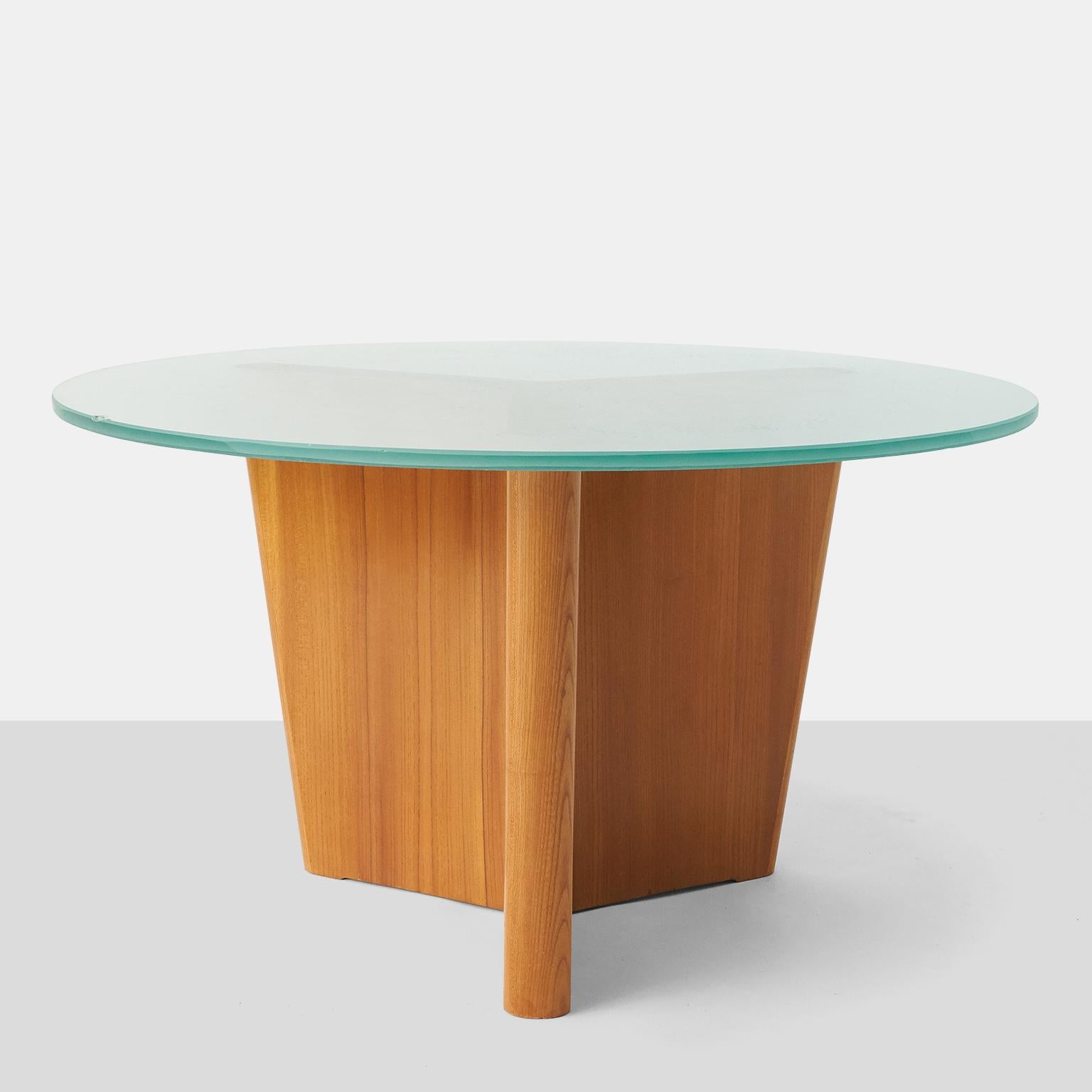 A round, etched glass coffee table with a tri-pronged base in elm. The frosted green glass top is etched with an ocean flora and fauna design.

Literature: Evan Snyderman & Karin Aberg Waerm, Greta Magnusson Grossman - A Car and Some Shorts,