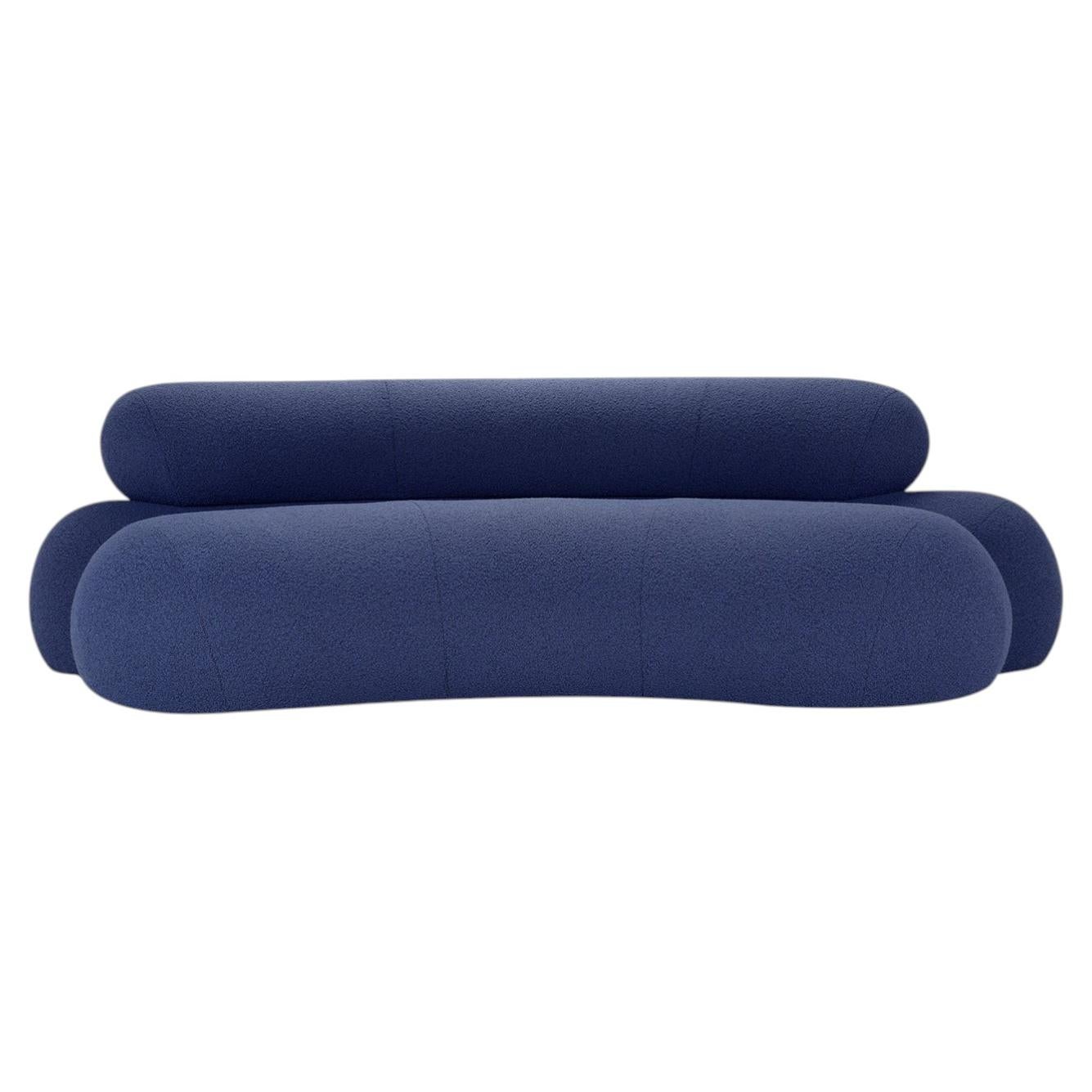 Nefelibata Komposition 4.1 Gebogenes Bouclè-Sofa Blau
