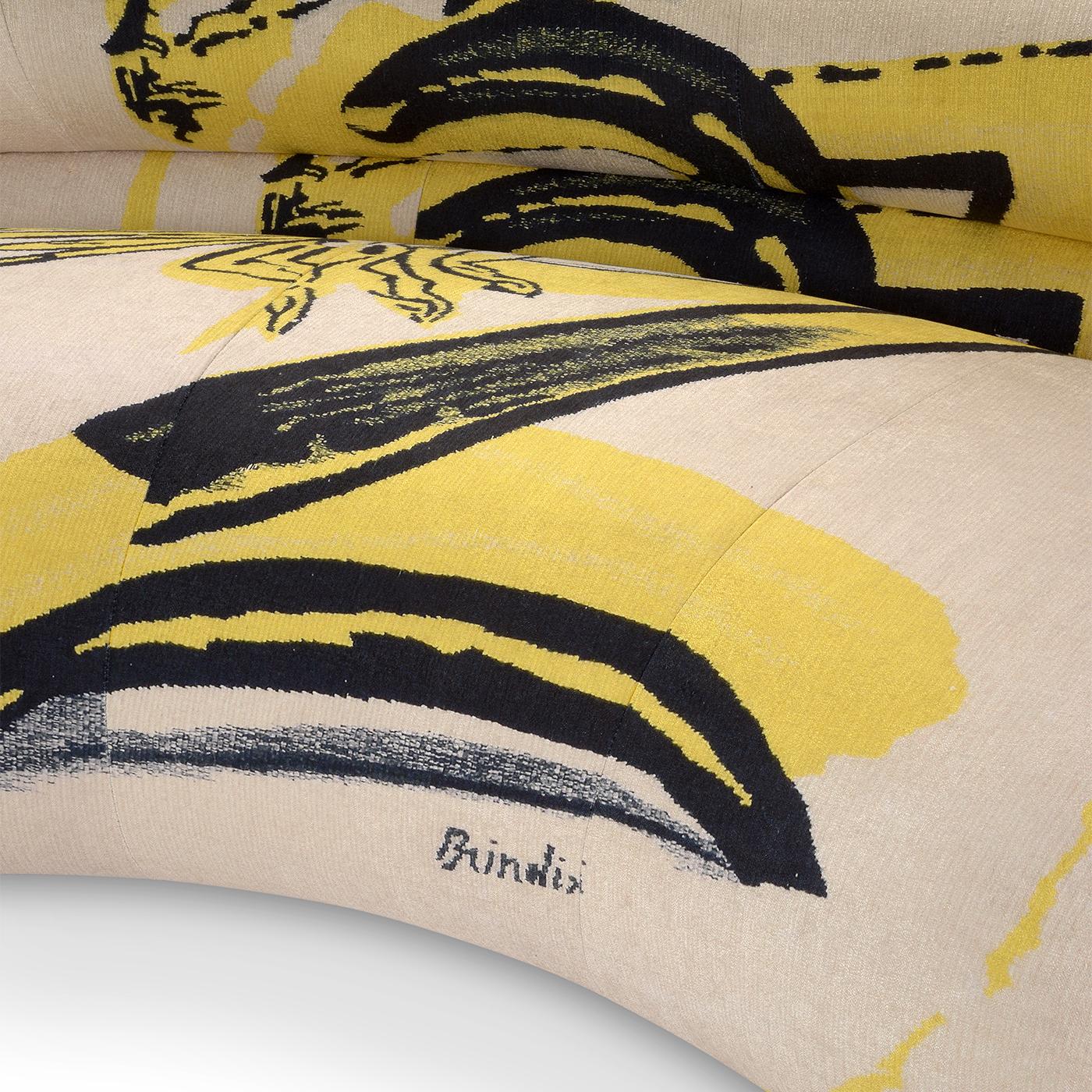 This unique piece, created exclusively for Edit Napoli 2024, is upholstered with the distinctive signs and colors of a one-of-a-kind tapestry by master Remo Brindisi. It features variable-density, deformable polyurethane foam, along with a 100g