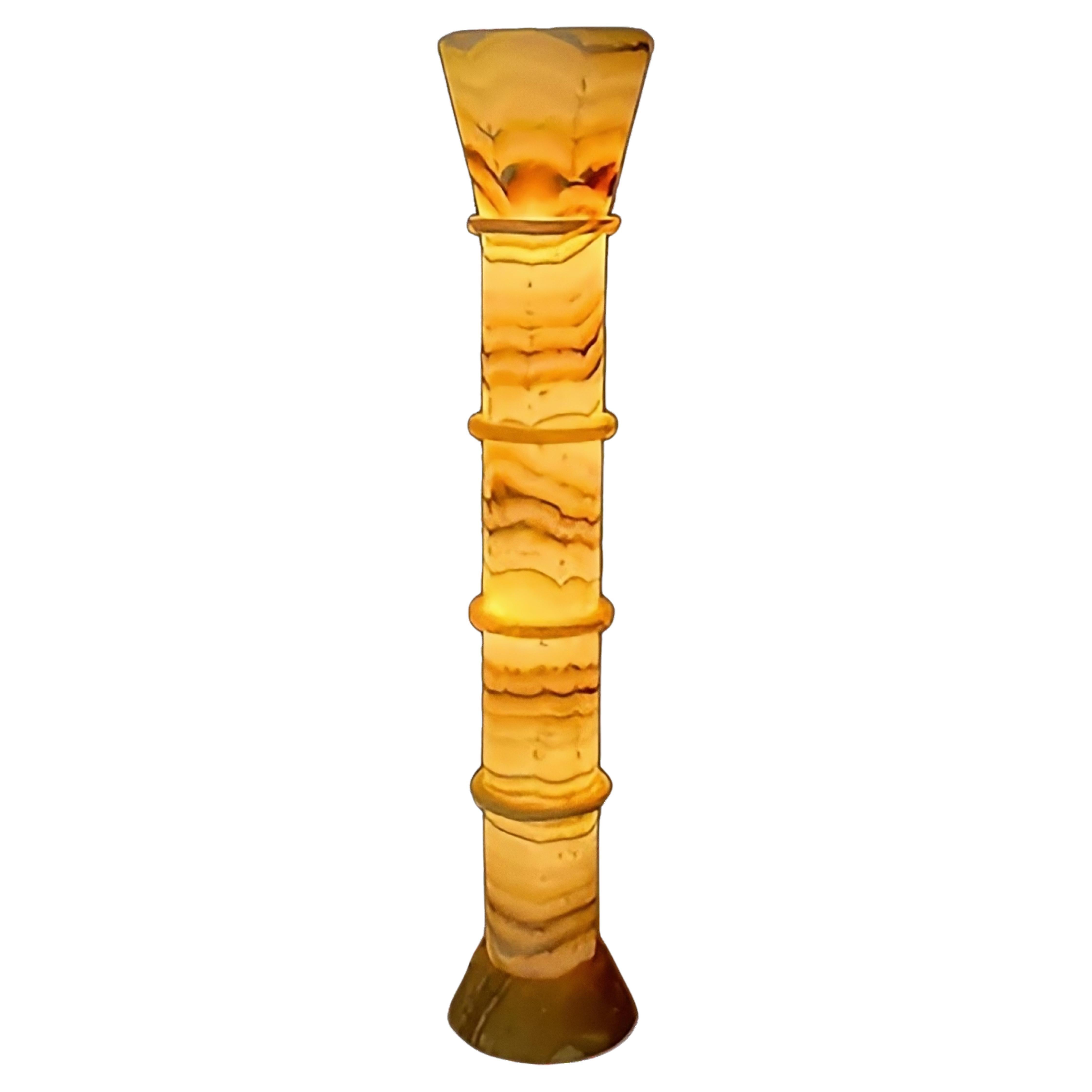 The Nefer Floor Lamp is additional design by Hassan Abouseda for HAF. 

This lamp features a unique design, meticulously hand-carved from Egyptian alabaster, with a beautiful glow that illuminates the entire length of the piece.

HAF is a boutique