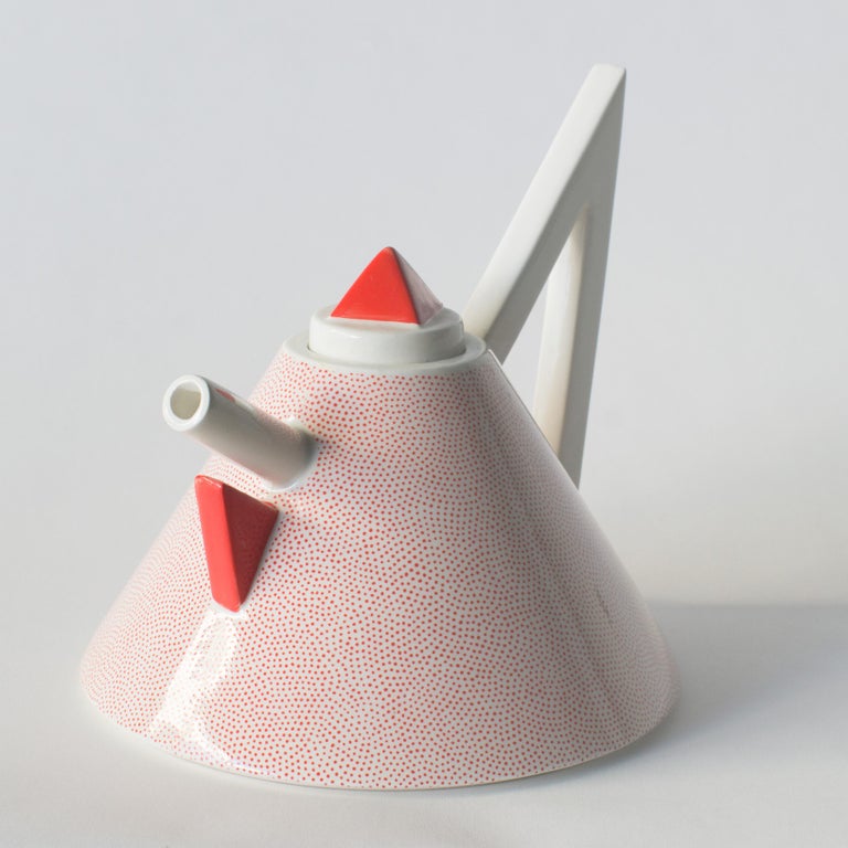 Vintage original 1980s Nefertiti tea pot. Red is vintage color which is no longer production now. There is signature on bottom.
Designed by Matteo Thun for Memphis Milano. 