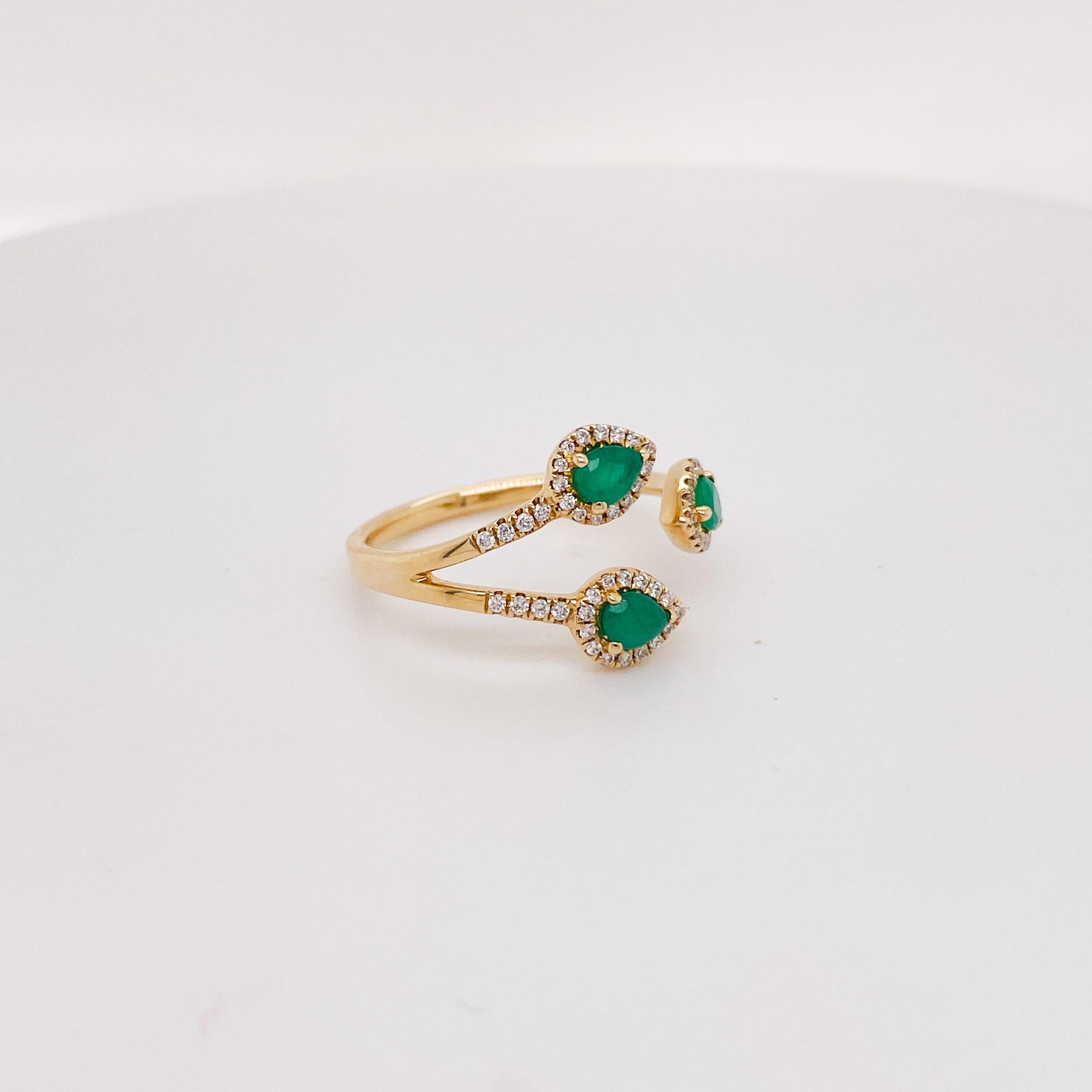 For Sale:  Negative Space Emerald & Diamond Ring Pear Shaped Diamond Halo Ring Sizable 2