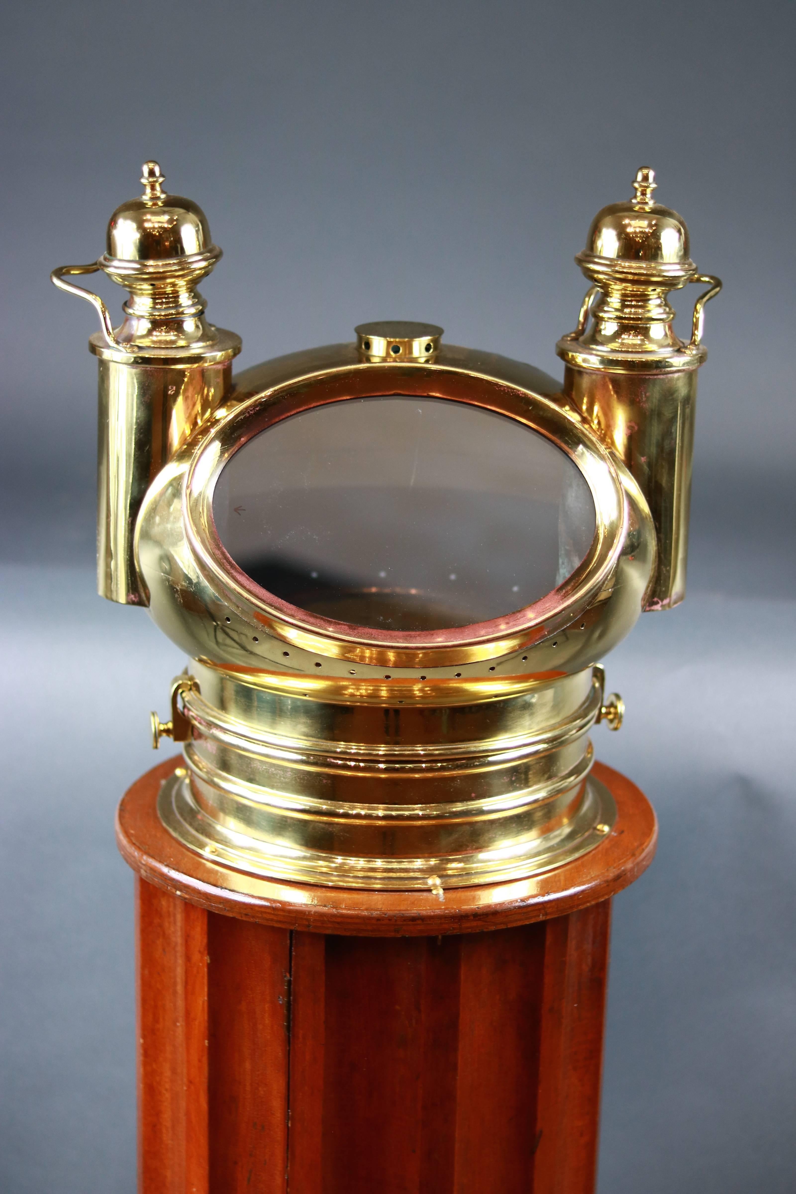 Late, 19th century ship's binnacle compass by Negus of New York. Turned, varnished mahogany Stand with brass hood stamped 