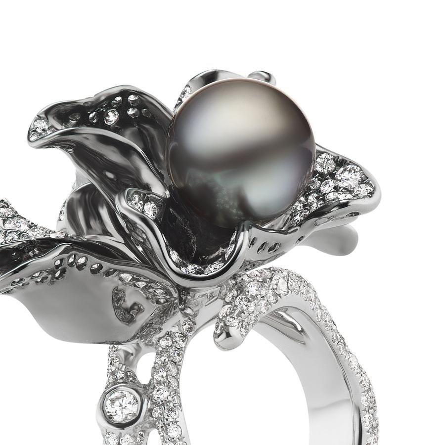 Orabella Ring designed by Neha Dani is sublimely set with a 9.75 Carat Black Tahitian Pearl. Accented by 3.67 Carat Diamonds, the ring is made of 18K White Gold that is a Custom Grey Rhodium Finish.