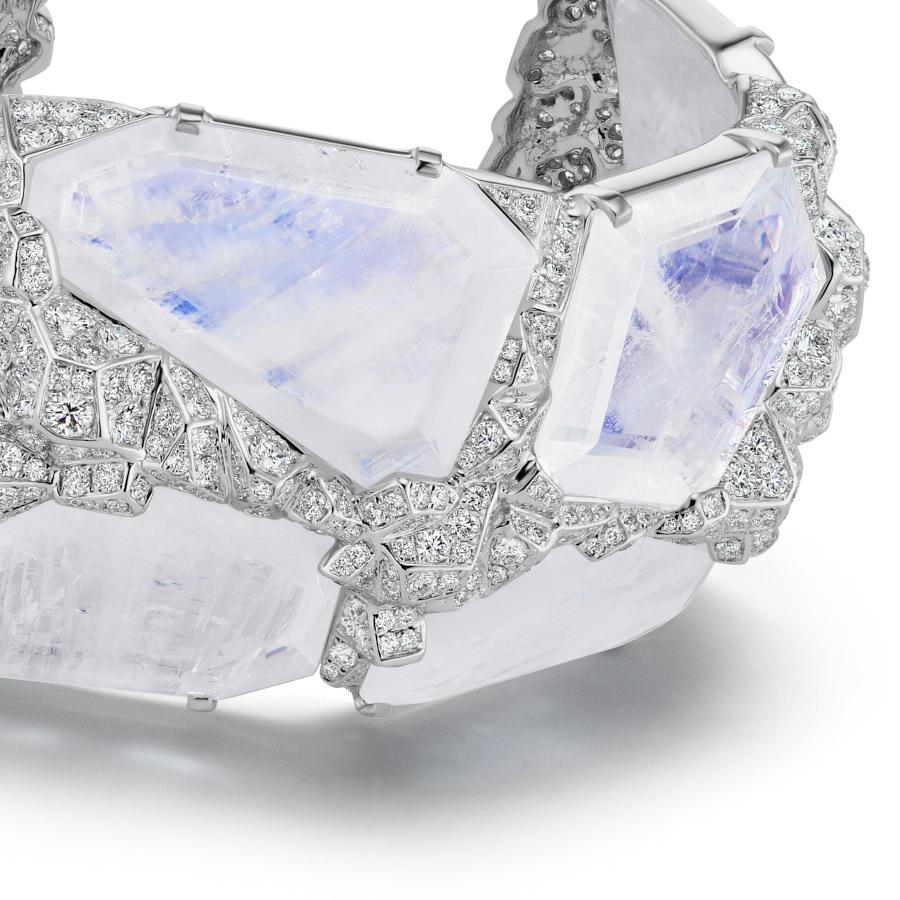 The Aialik Cuff Bracelet is created from 11 pieces of  Custom cut Blue Moonstones with a total weight of 163 Carat along with 10.36 Carat Round Diamonds and set in 18K White Gold. Neha Dani’s inspiration for this piece are the majestic glaciers of
