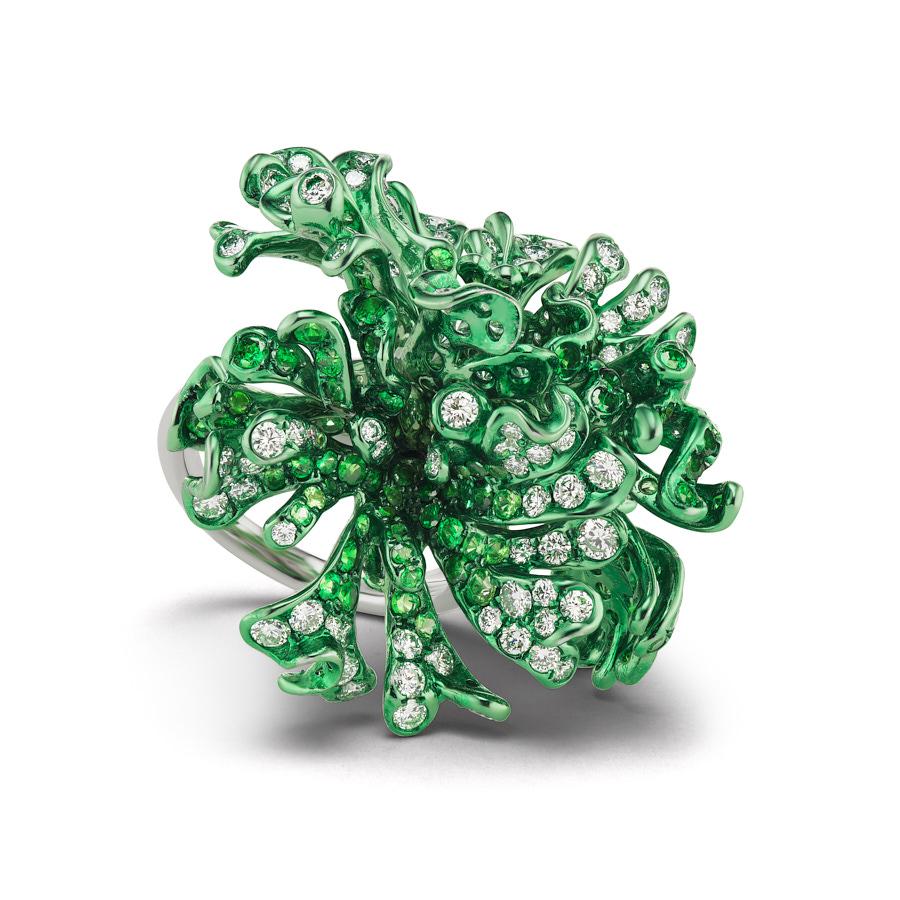 Myra Ring by Neha Dani has 3.95 Carat Round Diamonds and 4.12 Carat Tsavorite set on 18K Gold with Custom Green Rhodium Finish.
