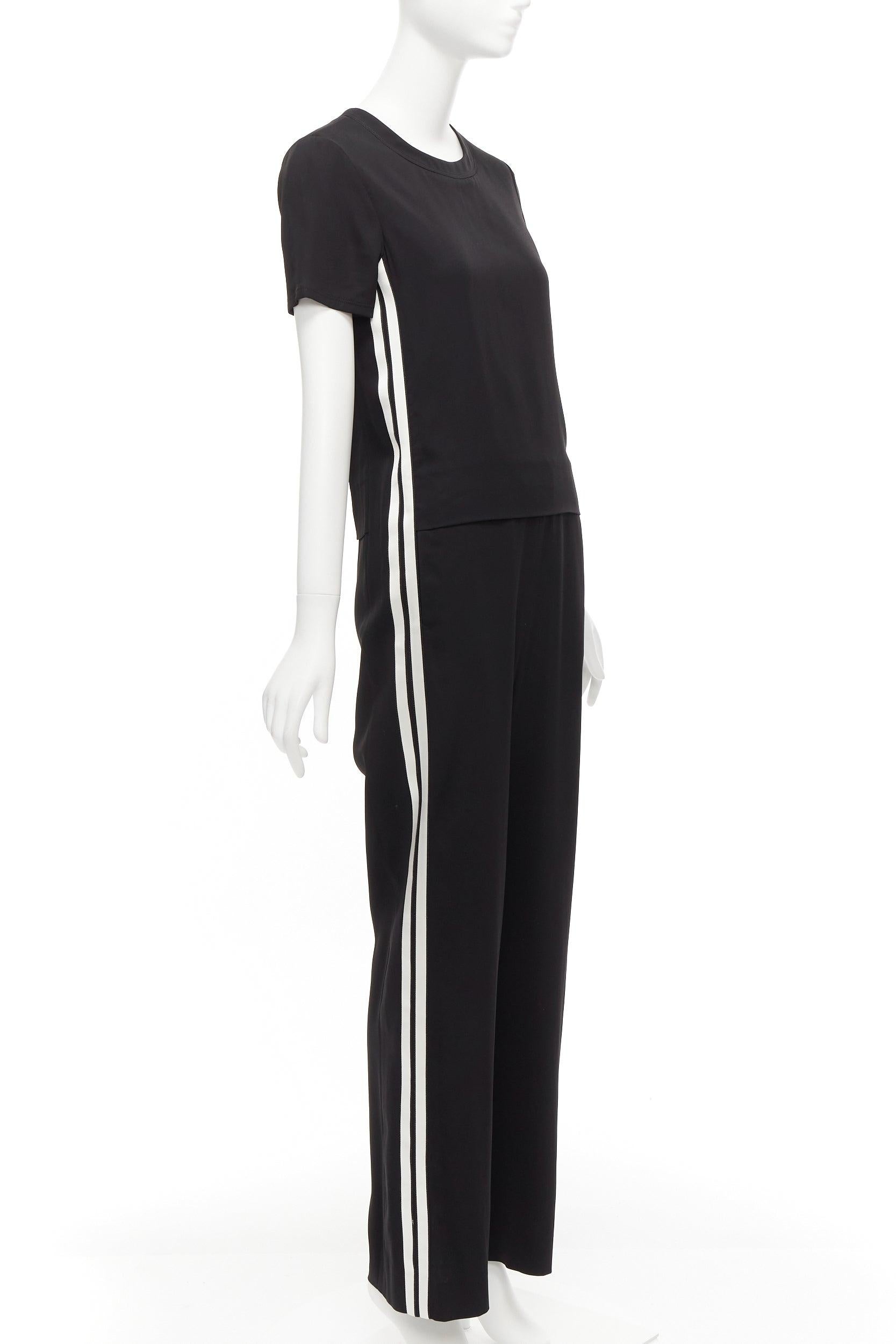 NEIL BARRETT black layered top white side stripes short crew jumpsuit FR38 M
Reference: NKLL/A00040
Brand: Neil Barrett
Material: Viscose
Color: Black, White
Pattern: Solid
Closure: Zip
Lining: Black Cupro
Extra Details: Back zip. Side white