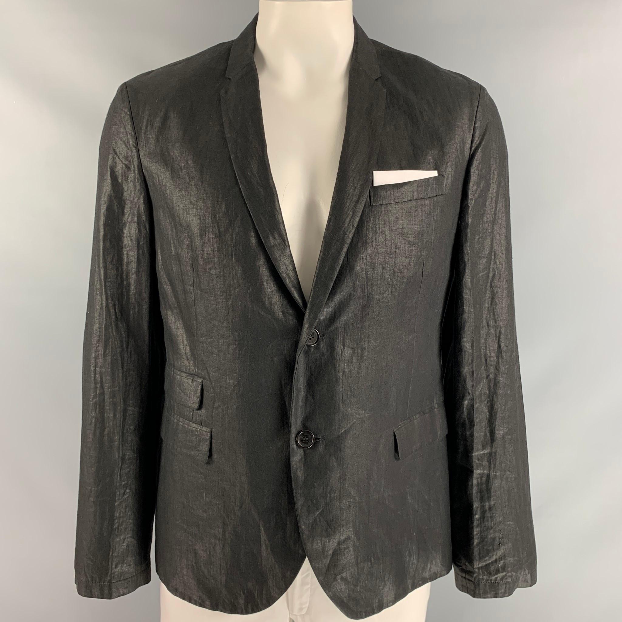 NEIL BARRETT sport coat, unlined comes in black linen with wrinkled texture featuring two button closure, flap pockets and notch lapel. Made in Italy.

Excellent Pre-Owned Condition. 
Marked: 52

Measurements:

Shoulder: 18 in
Chest: 44 in
Sleeve: