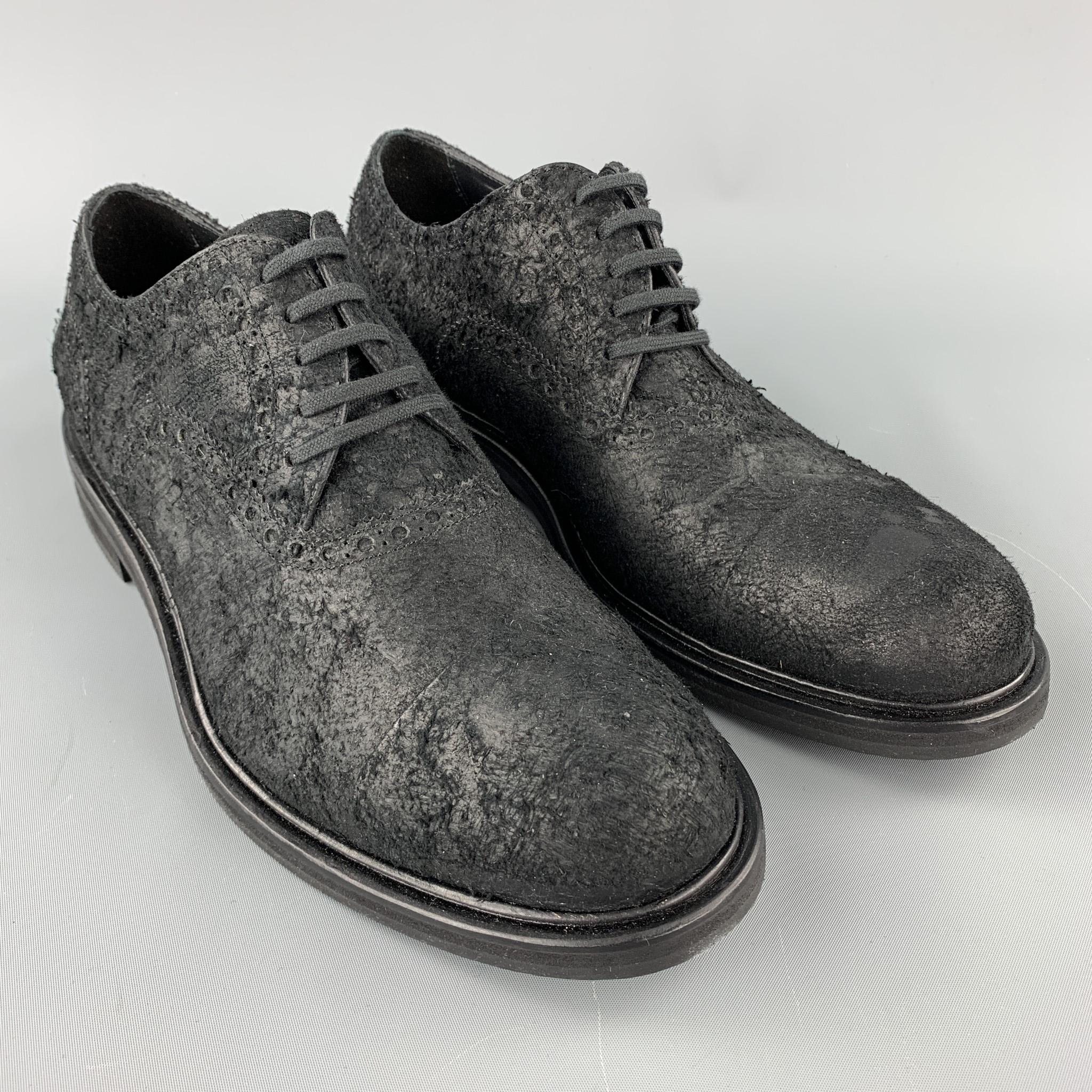 NEIL BARRETT shoes comes in a black textured suede featuring a cap toe, lace up, and a wooden sole. Made in Italy.

New With Box.
Marked: IT 43

Outsole:

12 in. x 4.5 in. 