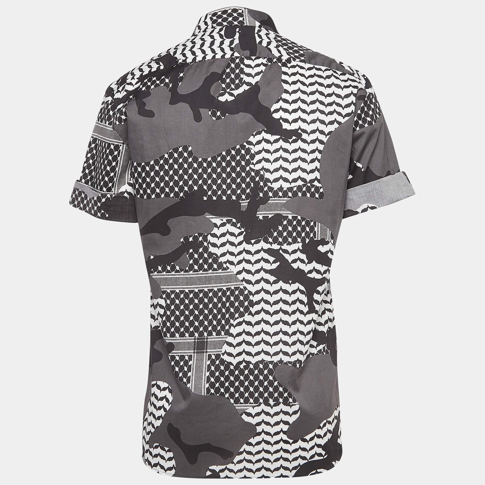 As shirts are an indispensable part of a wardrobe, Neil Barrett brings you a creation that is both versatile and stylish. It has been tailored from high-quality fabric for a classy look and fit.