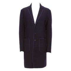 NEIL BARRETT abrigo largo en mezcla de lana azul marino con detalle de bolsillo ribeteado con cinta IT48 M