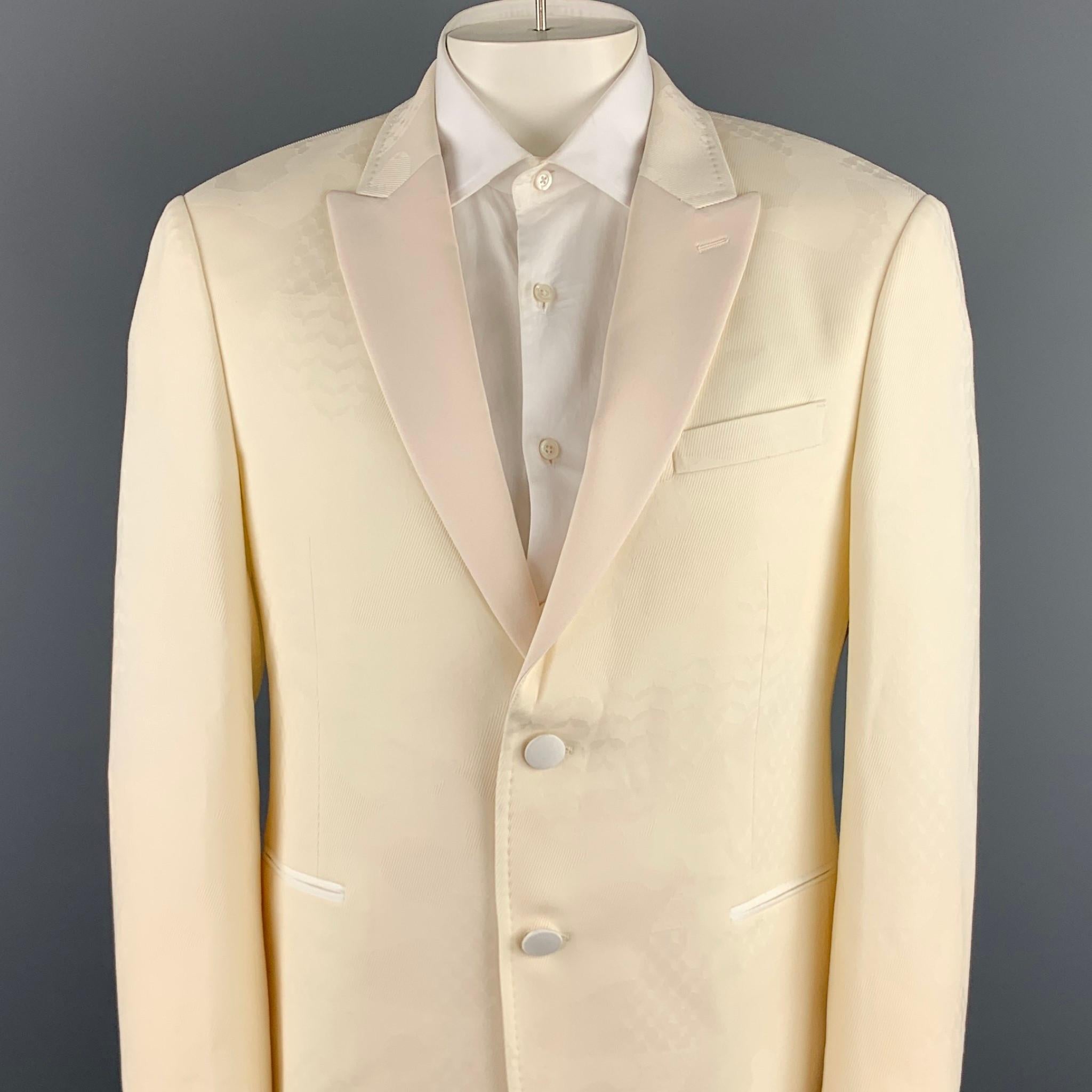 NEIL BARRETT sport coat comes in a cream jacquard wool / elastane with a full liner featuring a peak lapel, flap pockets, and a two button closure. Made in Italy.

New With Tags.
Marked: IT 54
Original Retail Price: