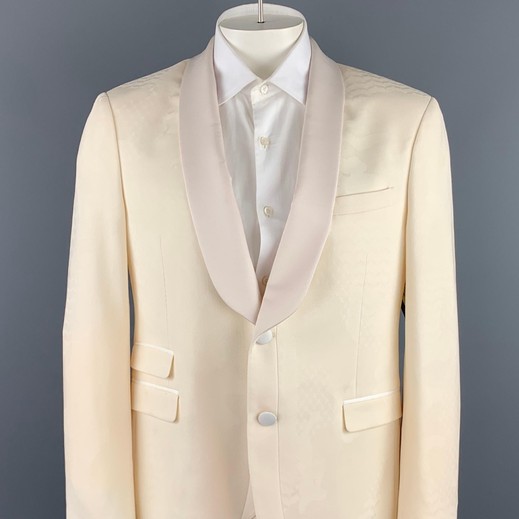 NEIL BARRETT sport coat comes in a cream jacquard wool / elastane with a full liner featuring a skinny fit, shawl lapel, flap pockets, and a two button closure. Made in Italy.

New With Tags.
Marked: IT 54
Original Retail Price: