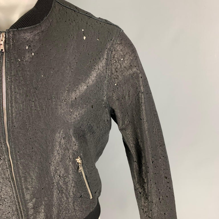 NEIL BARRETT jacket comes in a black distressed goat leather with a white liner featuring a bomber style, skinny fit, ribbed hem, zipper pockets, and a zip up closure. Made in Italy. 

New With Tags.
Marked: L
Original Retail Price: