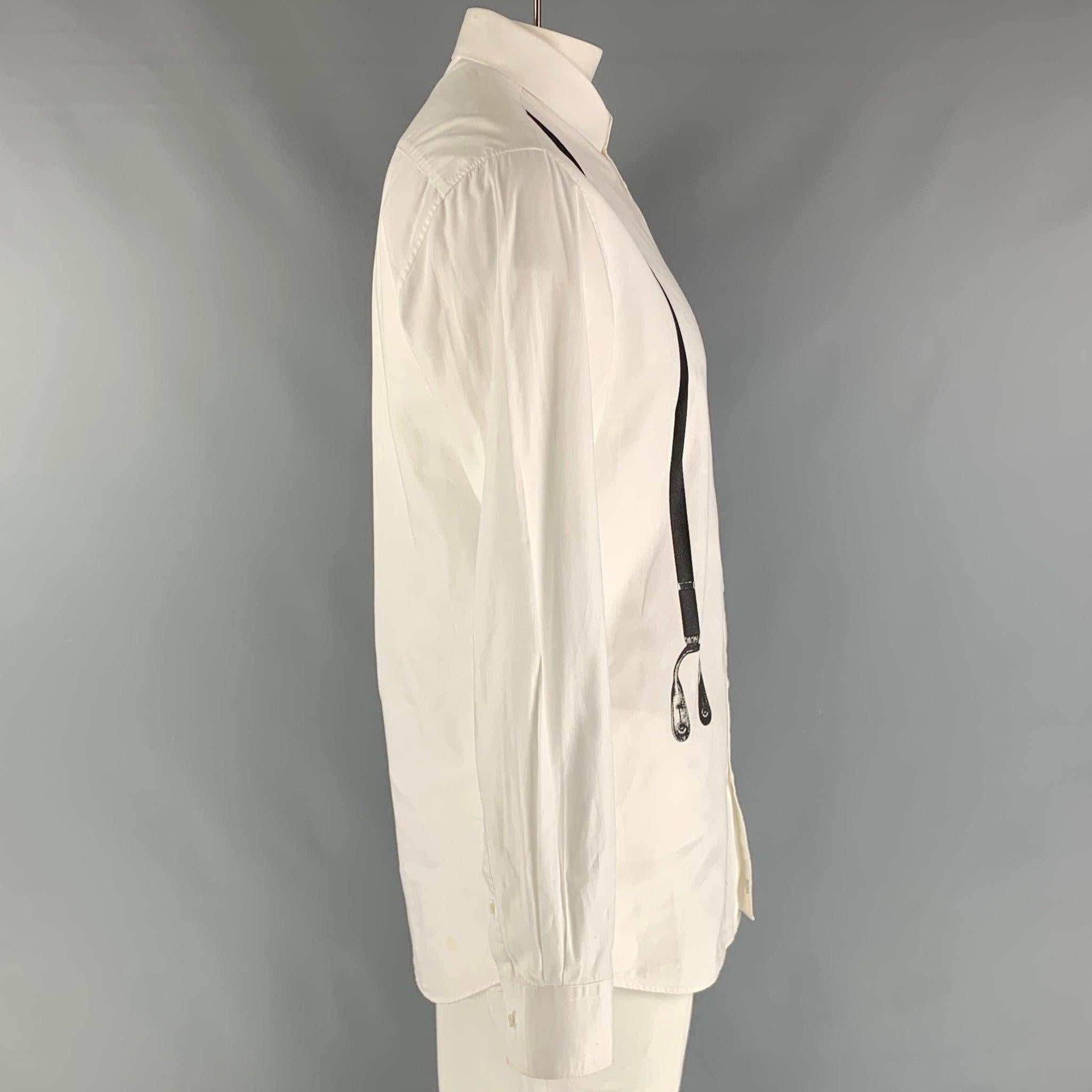 NEIL BARRETT 'slim fit' long sleeve shirt comes in a white cotton featuring a black suspenders print at front, spread collar, and buttons closure. Made in Italy.Good Pre-Owned Condition. Moderate wear. Discolorations through out. 

Marked:   42- 18