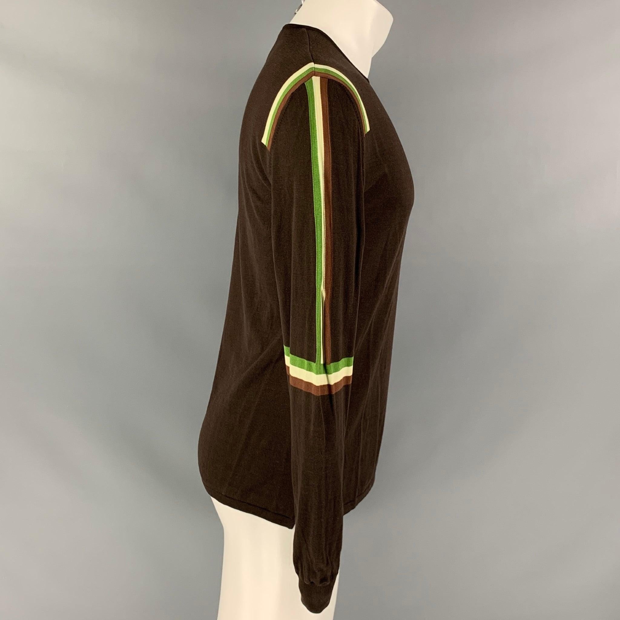 NEIL BARRETT pullover in a brown cotton jersey knit featuring green stripe details, slim fit, and crew neck. Made in Italy.Excellent Pre-Owned Condition. 

Marked:   M 

Measurements: 
 
Shoulder: 20 inches Chest: 42 inches Sleeve: 27 inches Length: