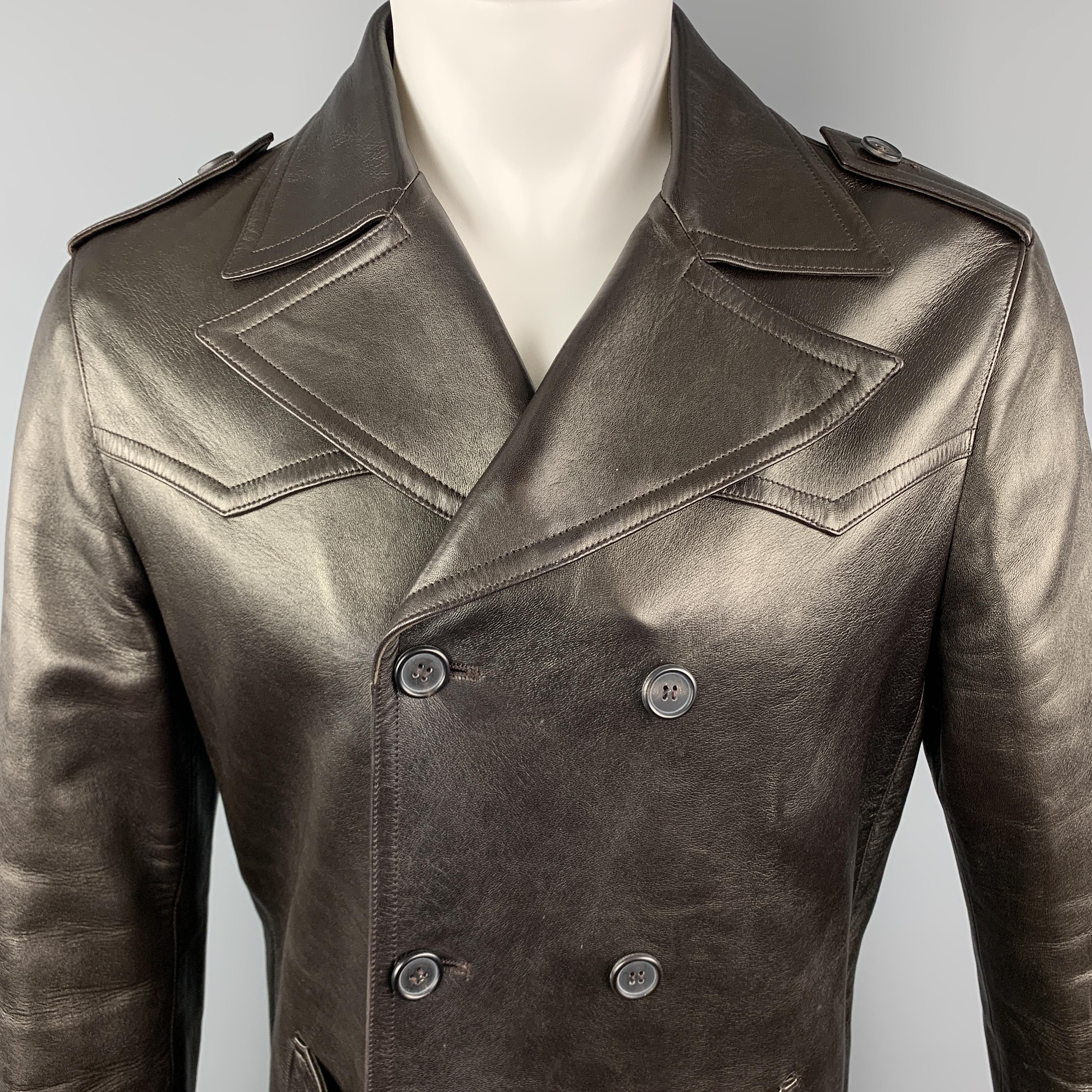 NEIL BARRETT trench style coat comes n chocolate brown leather with epaulets, double breasted button front, pointed lapel, and flap pockets. With dust bag. Made in Italy.

Excellent Pre-Owned Condition.
Marked: M

Measurements:

Shoulder: 18